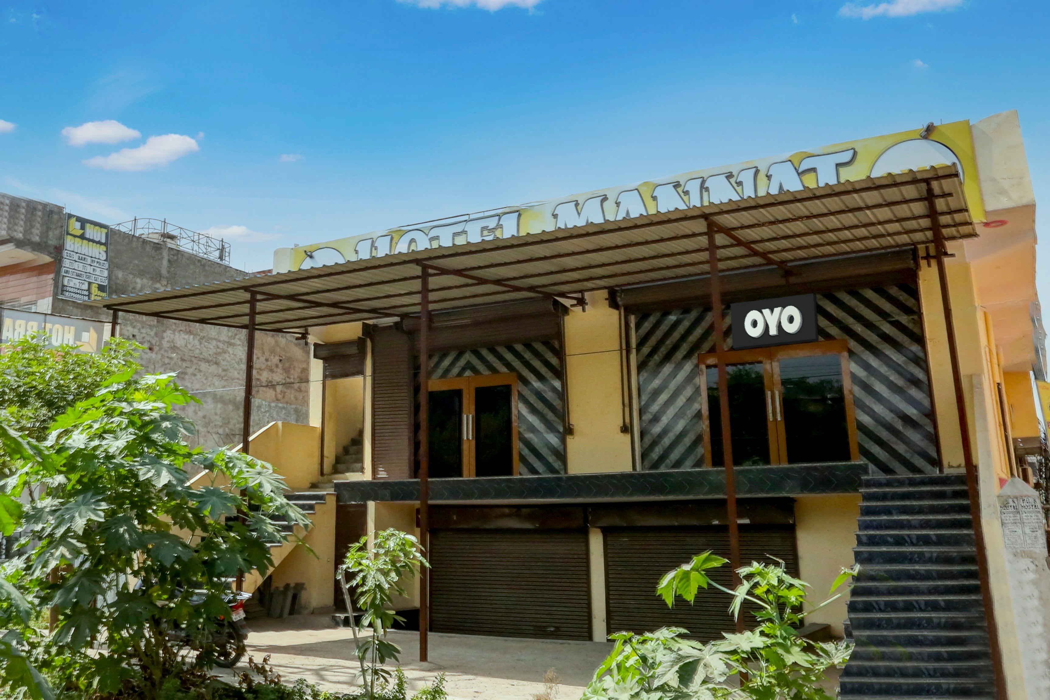 OYO 90856 HOTEL MANNAT - Tap to explore photos