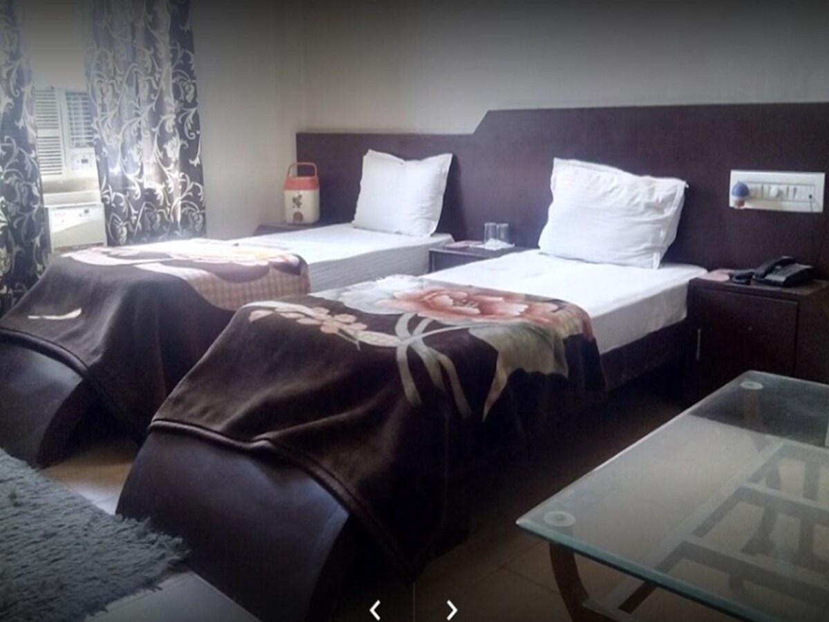 Yuvraj Hotel - Tap to explore photos