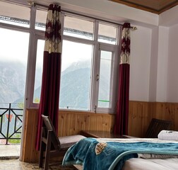 DELUXE ROOM WITH MOUNTAIN VIEW