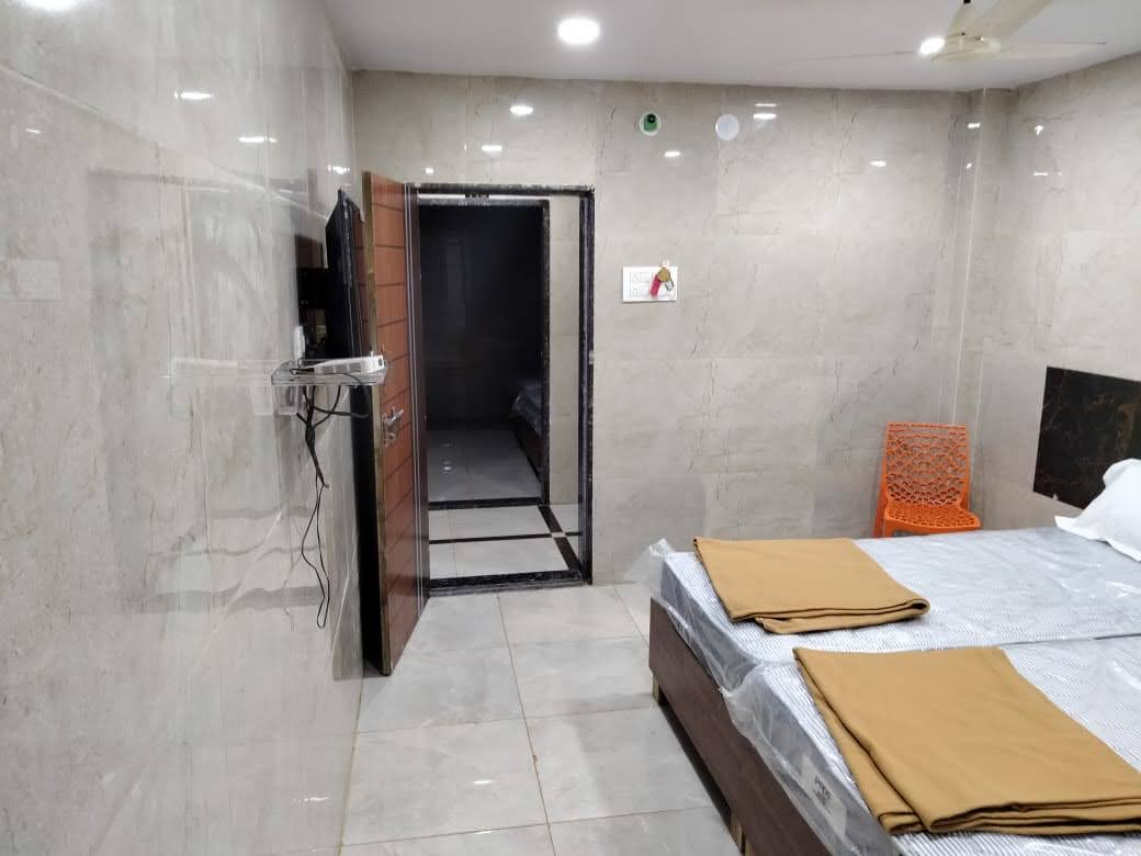 Hotel Ravitheja  Lodging & Boarding - Tap to explore photos
