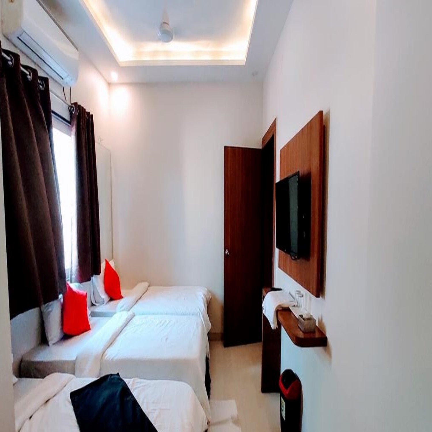 Hotel Trimurti Executive - Tap to explore photos