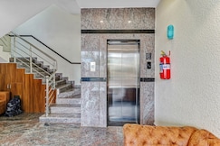 Capital O Safari Rooms Near Snow City, Bangalore