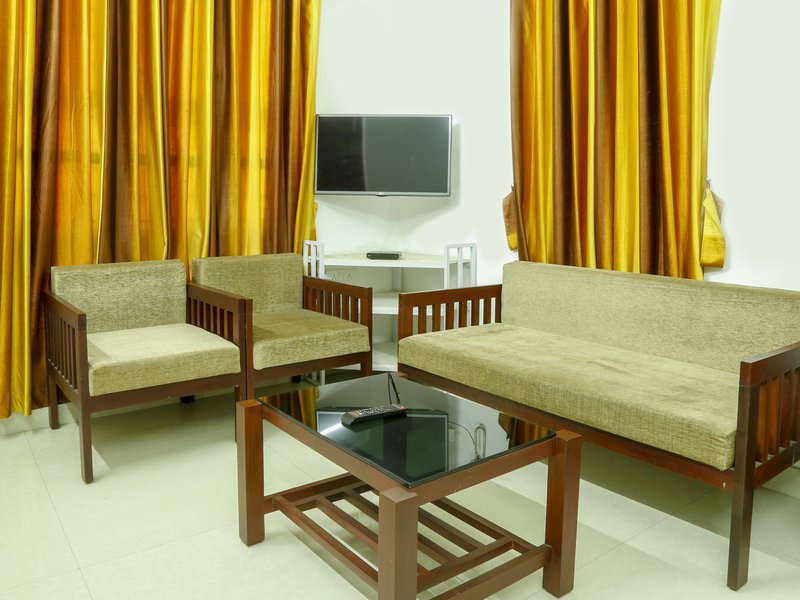 Traven Homes Infopark | Corporate Suite Rooms - Tap to explore photos