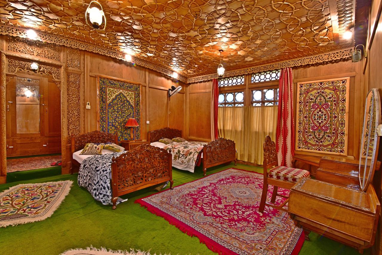 The Great Kashmir Houseboats - Tap to explore photos