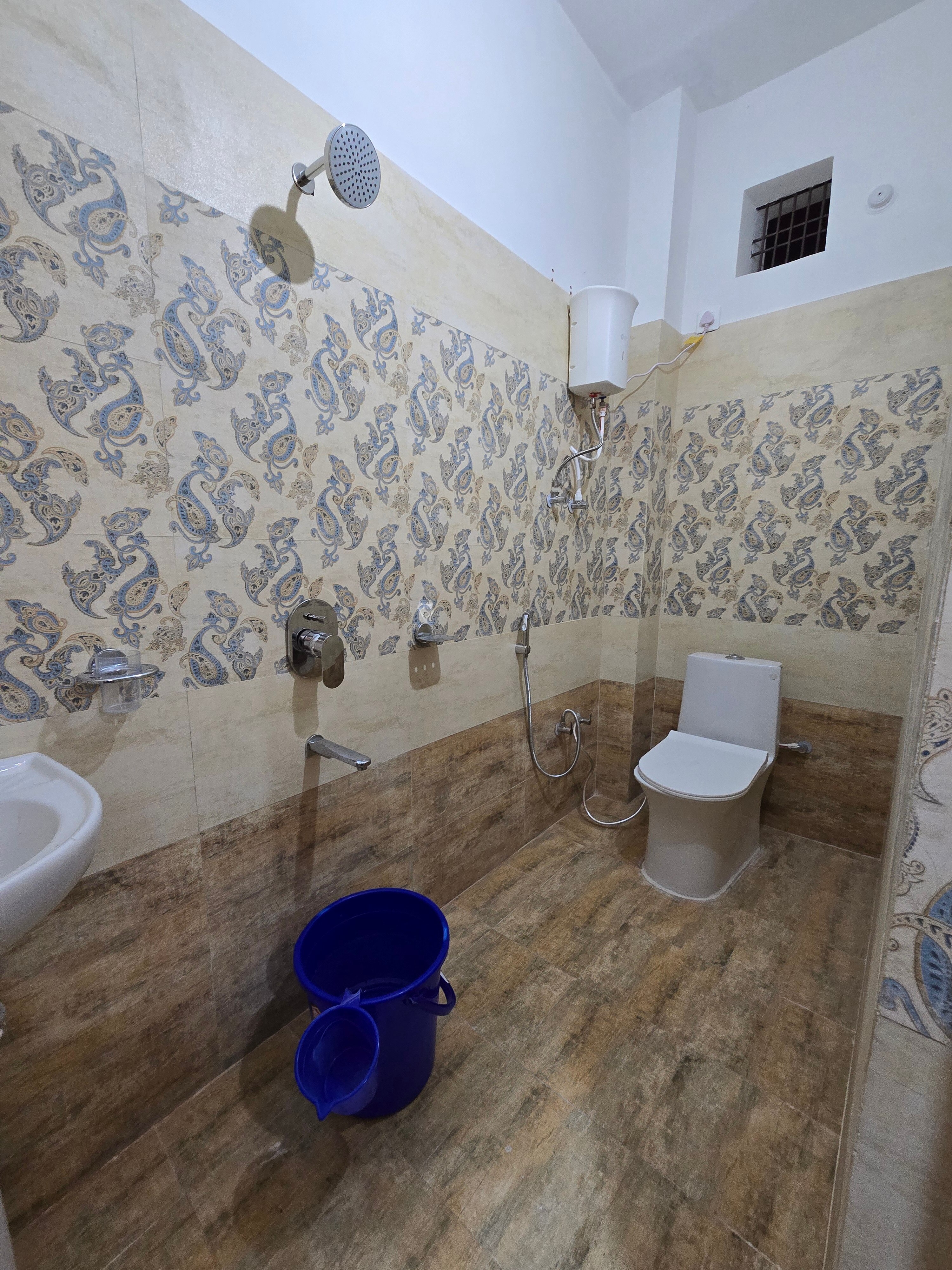 Archana Guest House - Tap to explore photos