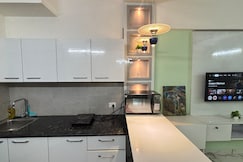 The Velvet Nook 1BHK Suite 40 TV Self checkin, Gurgaon