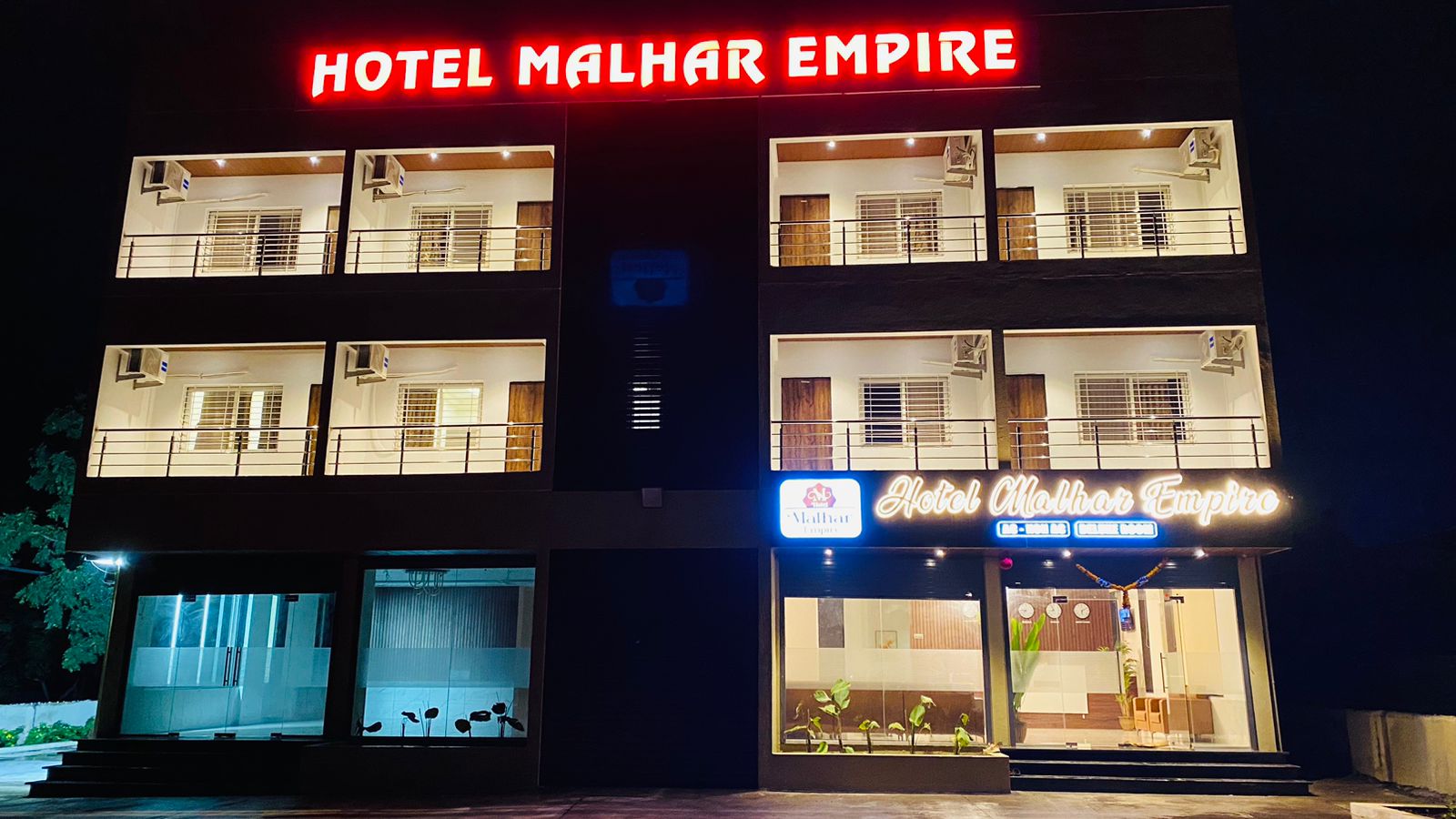 Hotel Malhar Empire - Tap to explore photos