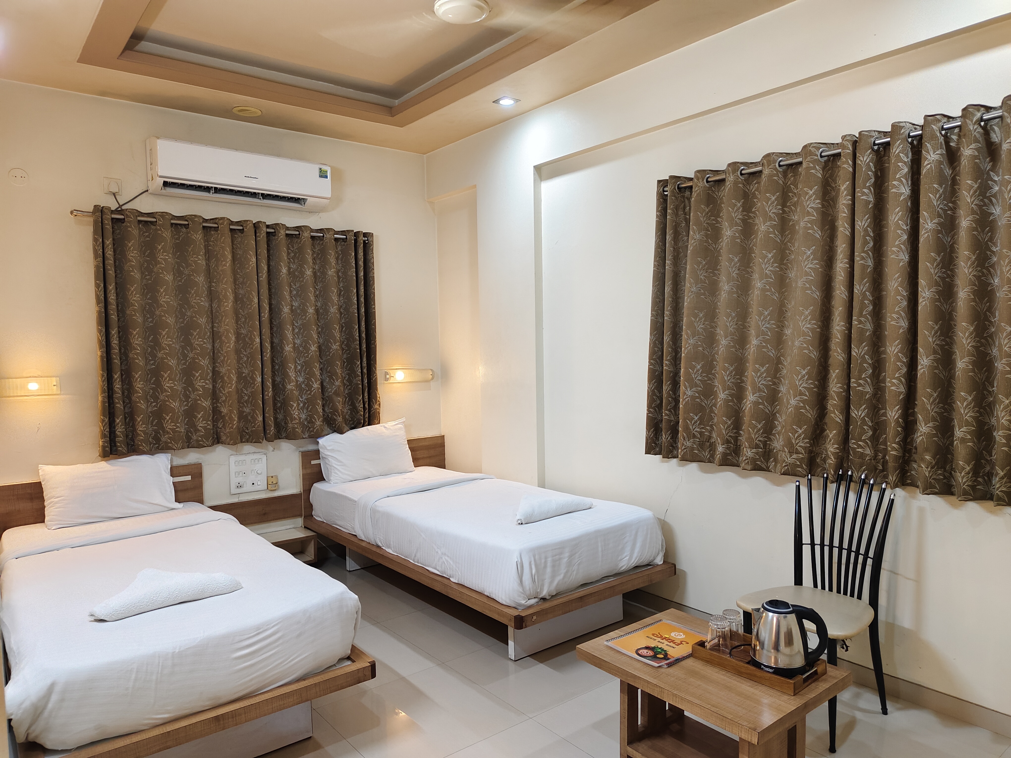 Gandharva Inn - Tap to explore photos