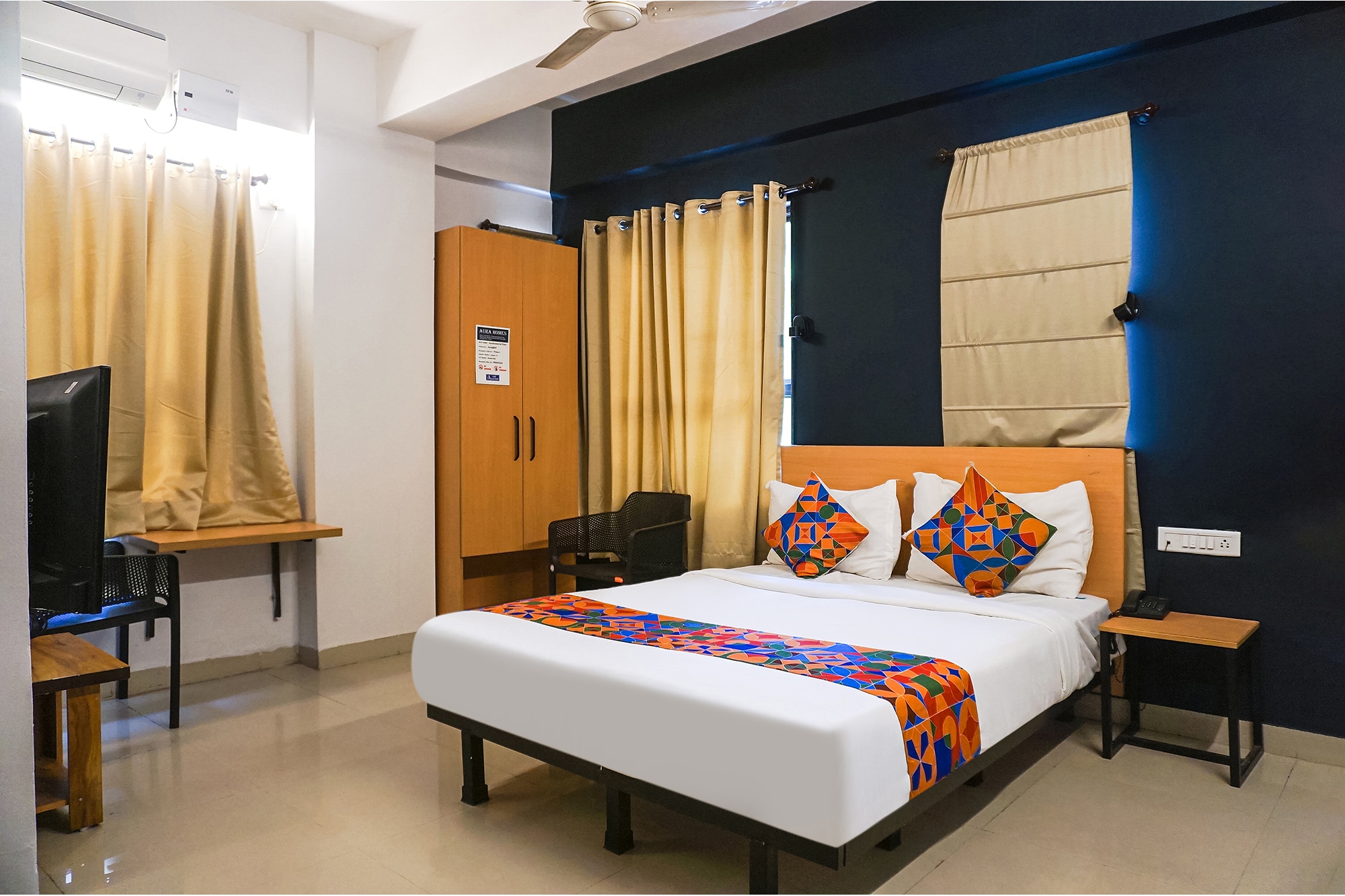 FabHotel Aura Homes - Nr. Khandoba Mandir - Tap to explore photos