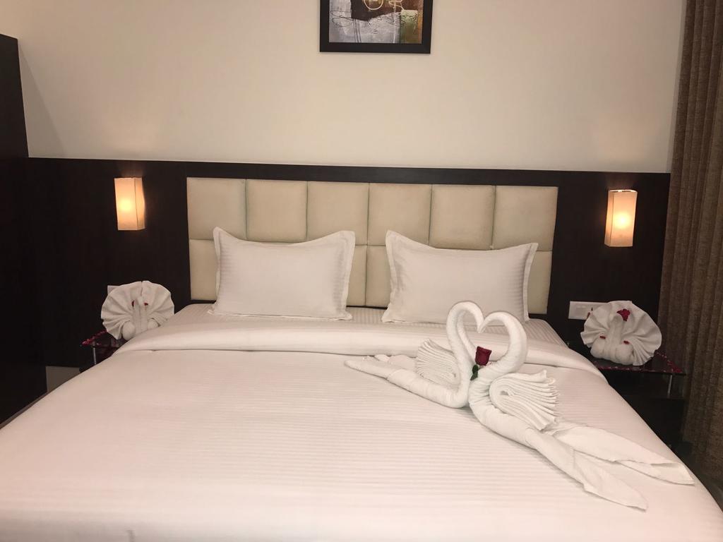 Hotel Anandi Inn By BookingCare - Tap to explore photos