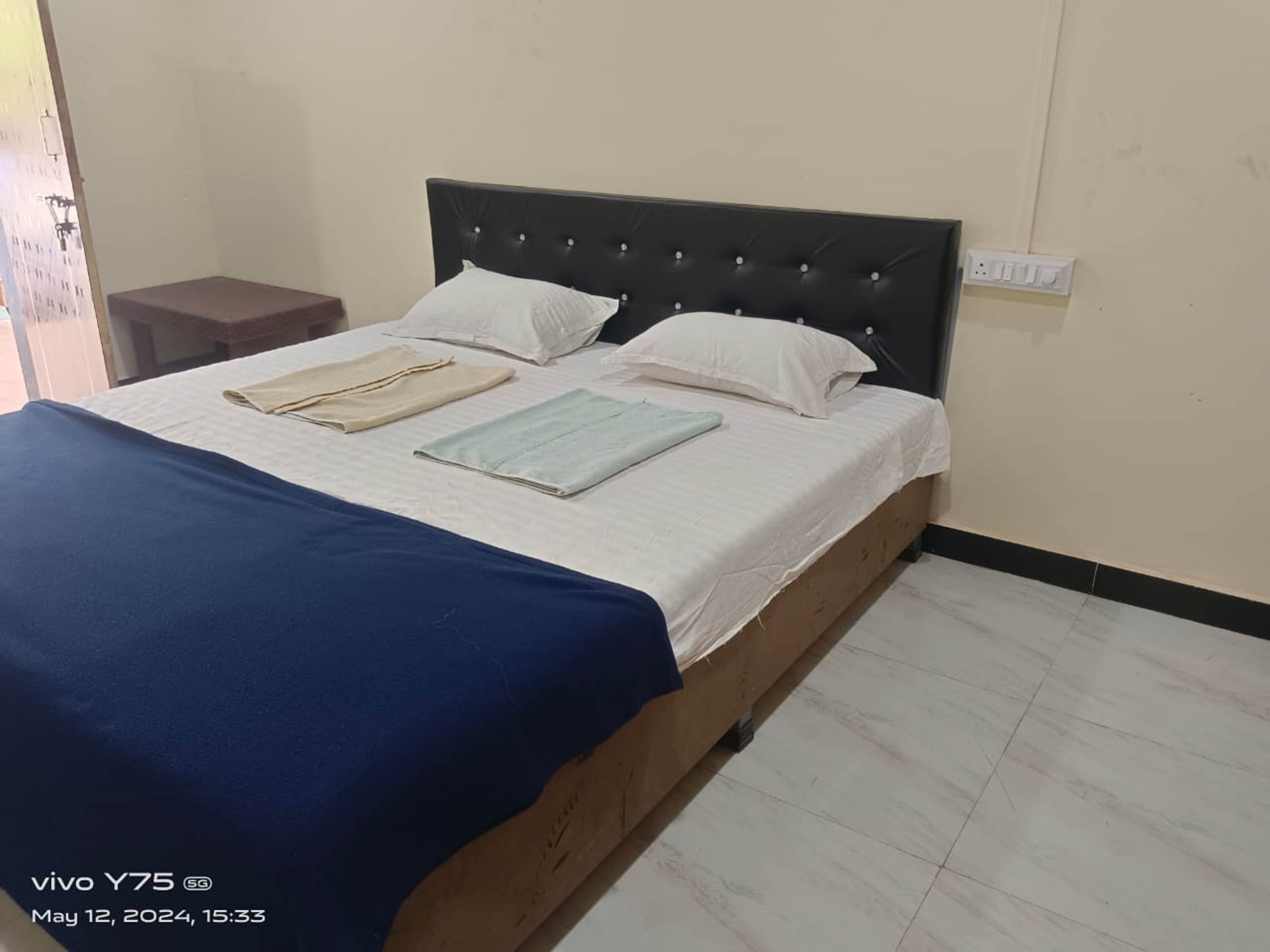 Diveagar Nature View Rooms - Tap to explore photos