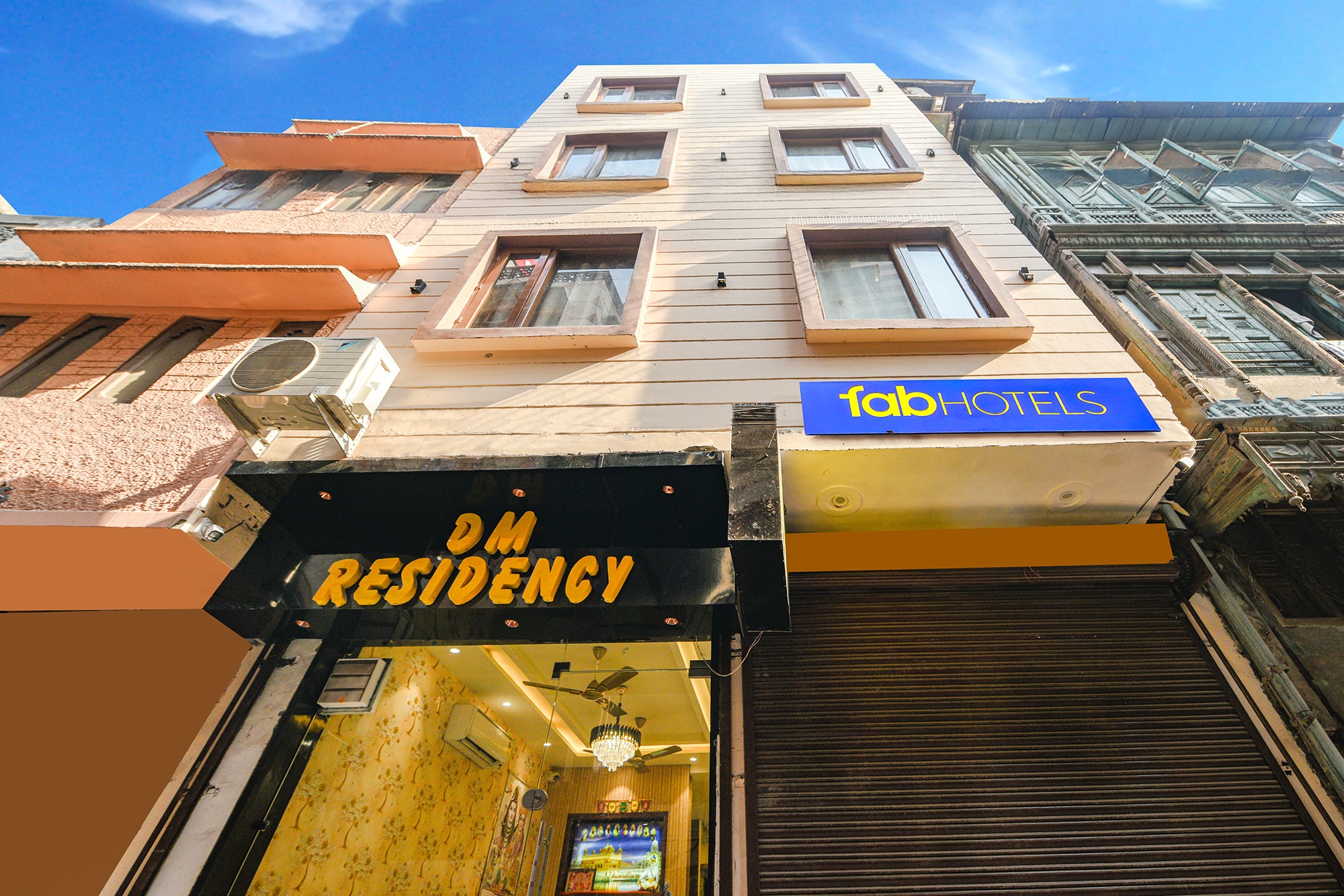 FabHotel DM Residency - Tap to explore photos