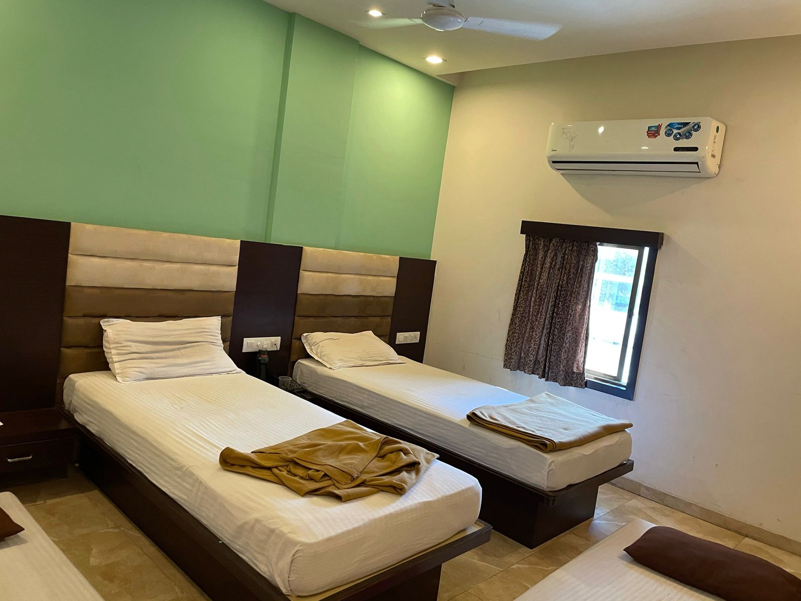 Hotel Narmada - Tap to explore photos