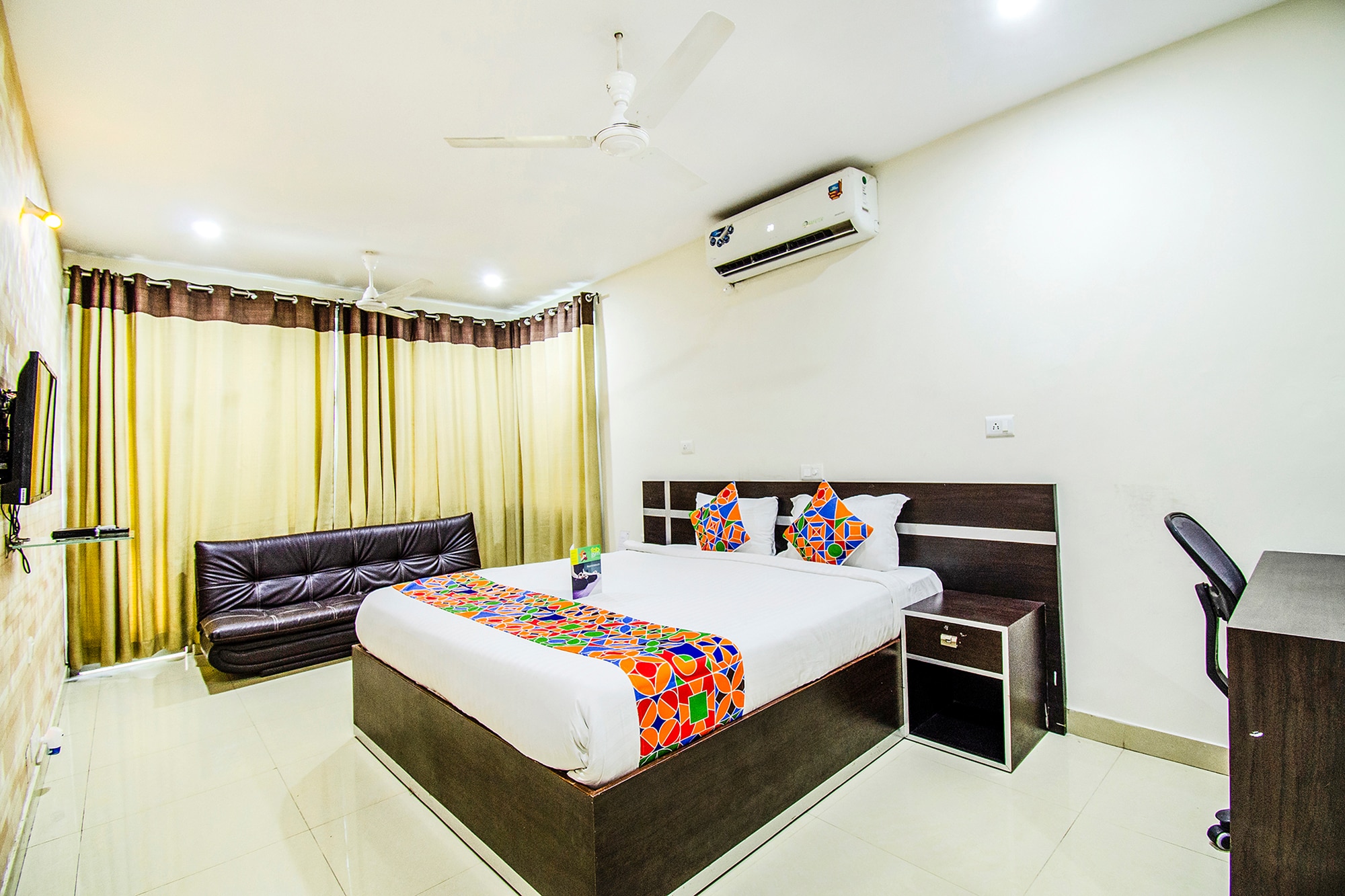 FabHotel Pride Inn - Nr TCS Deccan Park, Hitech City - Tap to explore photos