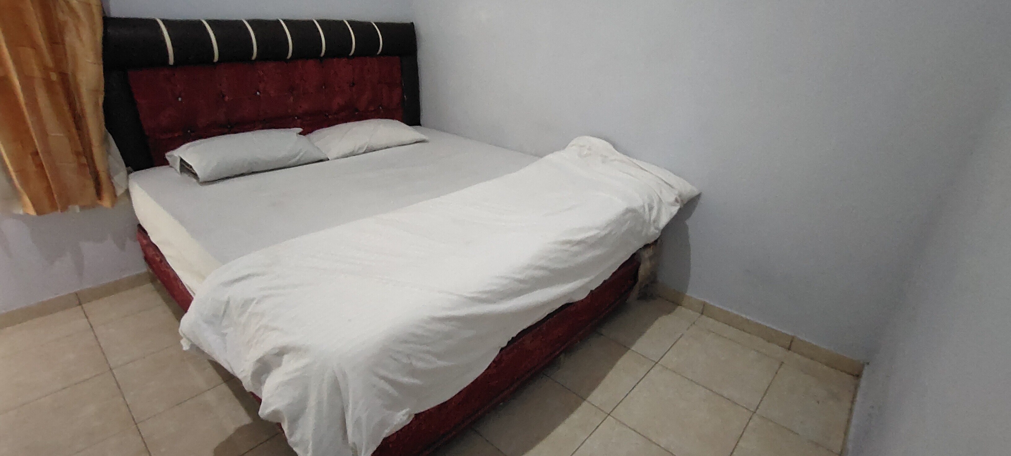 OYO 92224 Hotel Tris - Tap to explore photos