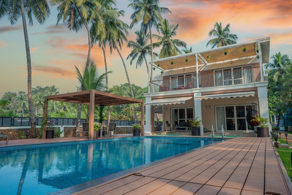 Annant Villa Luxurious Riverfront Retreat by Tisya Stays - Tap to explore photos