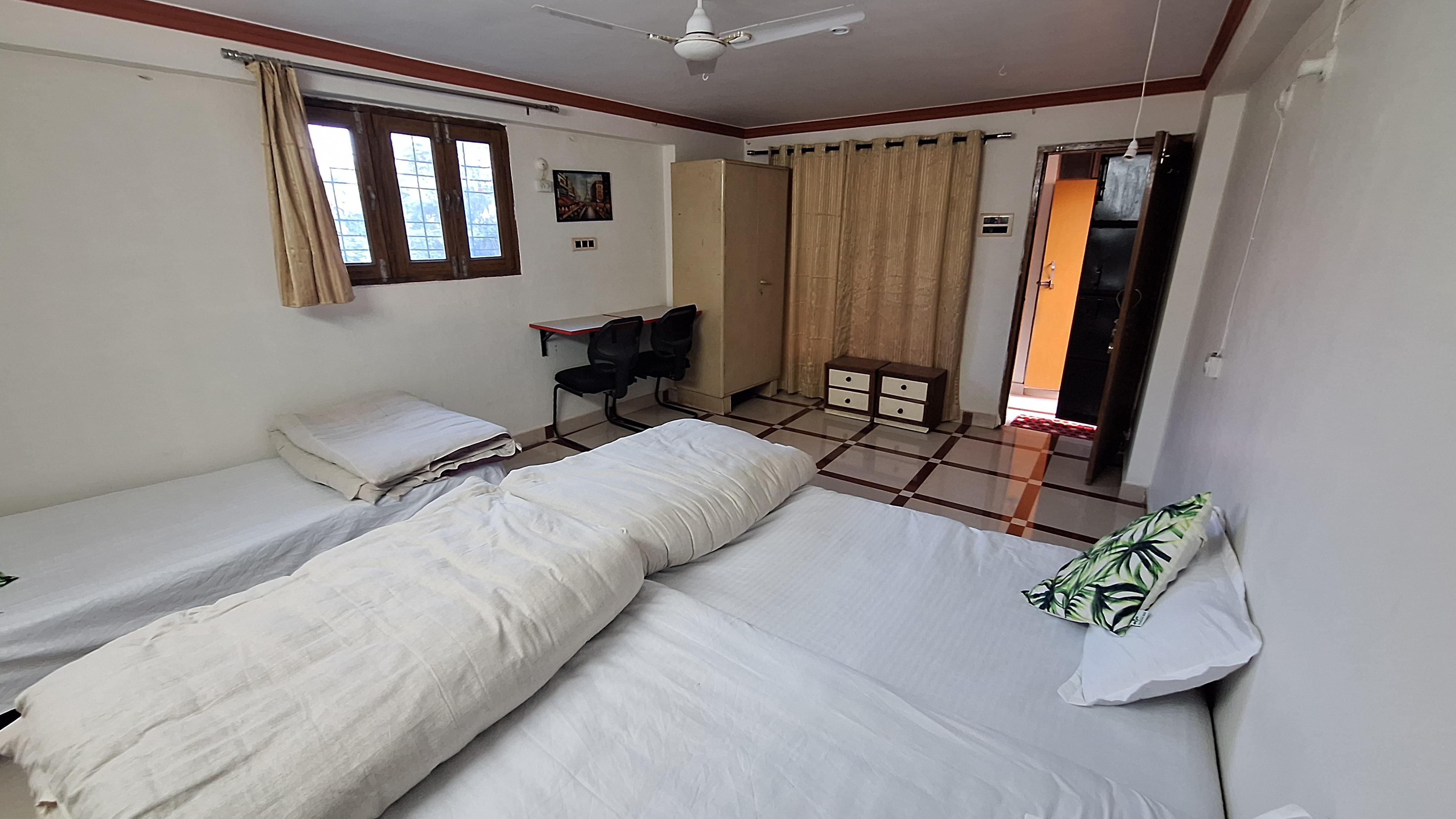 Triveni Stays - Tap to explore photos