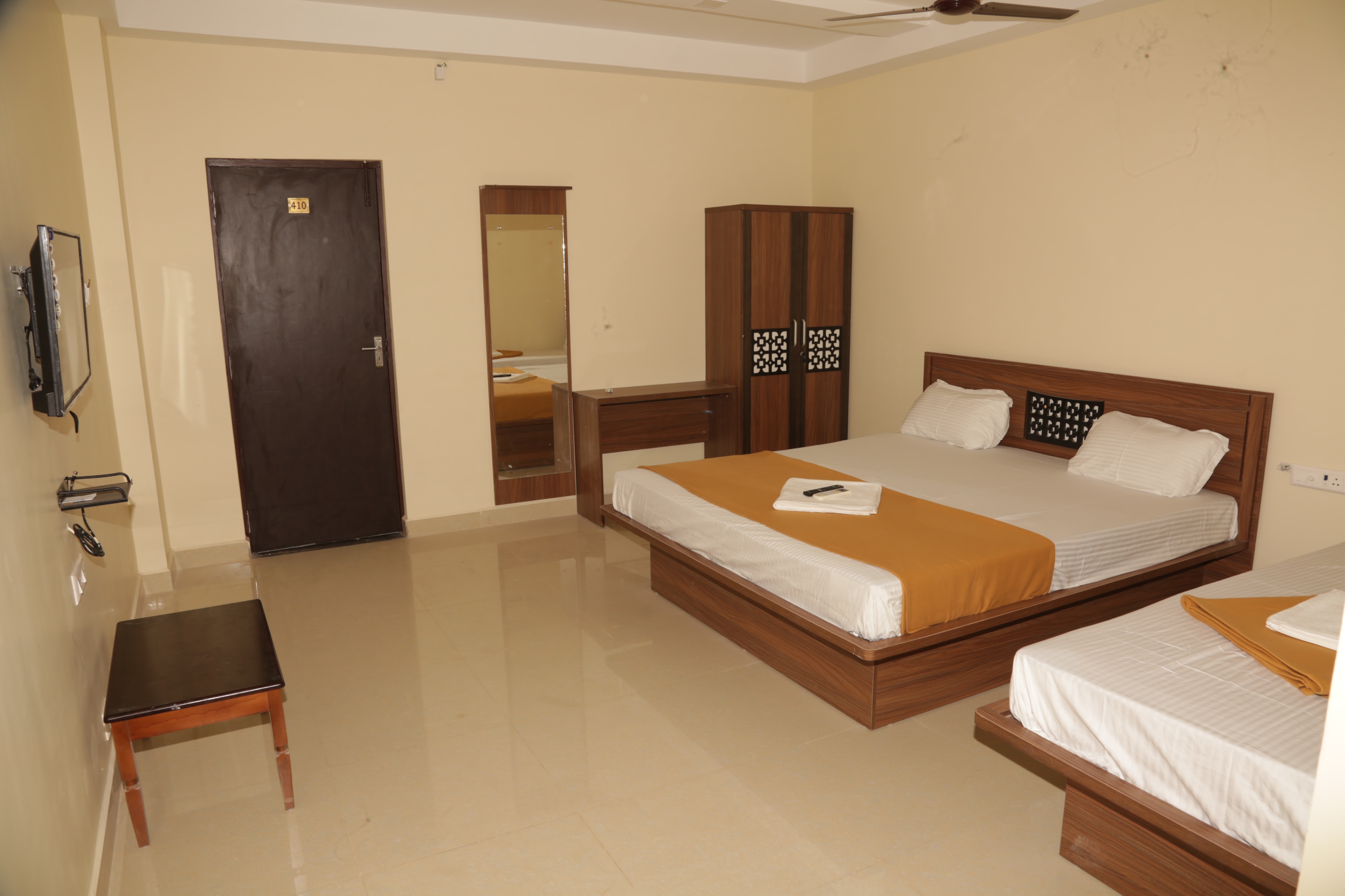 Hotel Santhosh Inn - Tap to explore photos