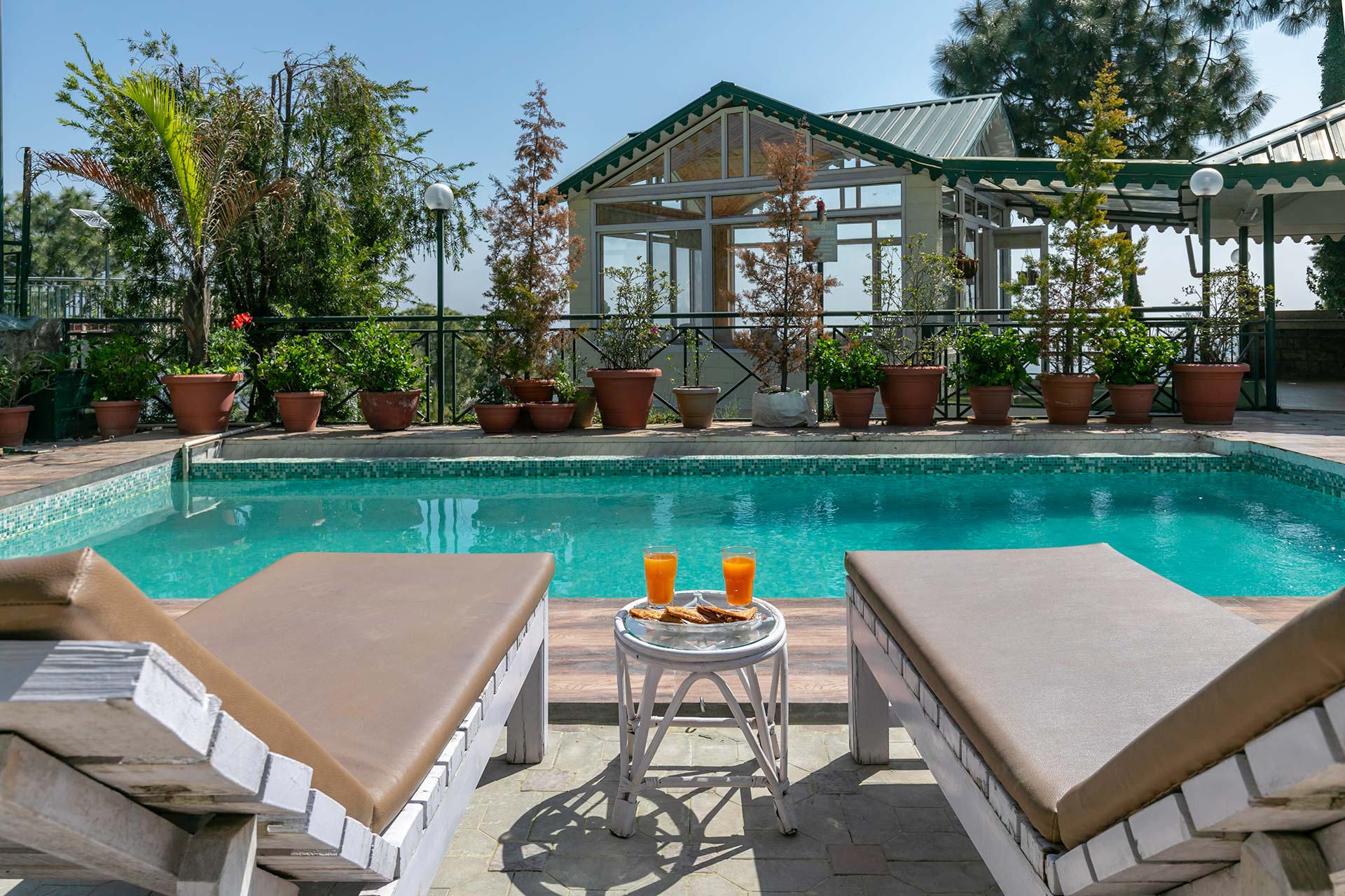 StayVista at Villa Mountain Crest w/ Outdoor Pool - Tap to explore photos