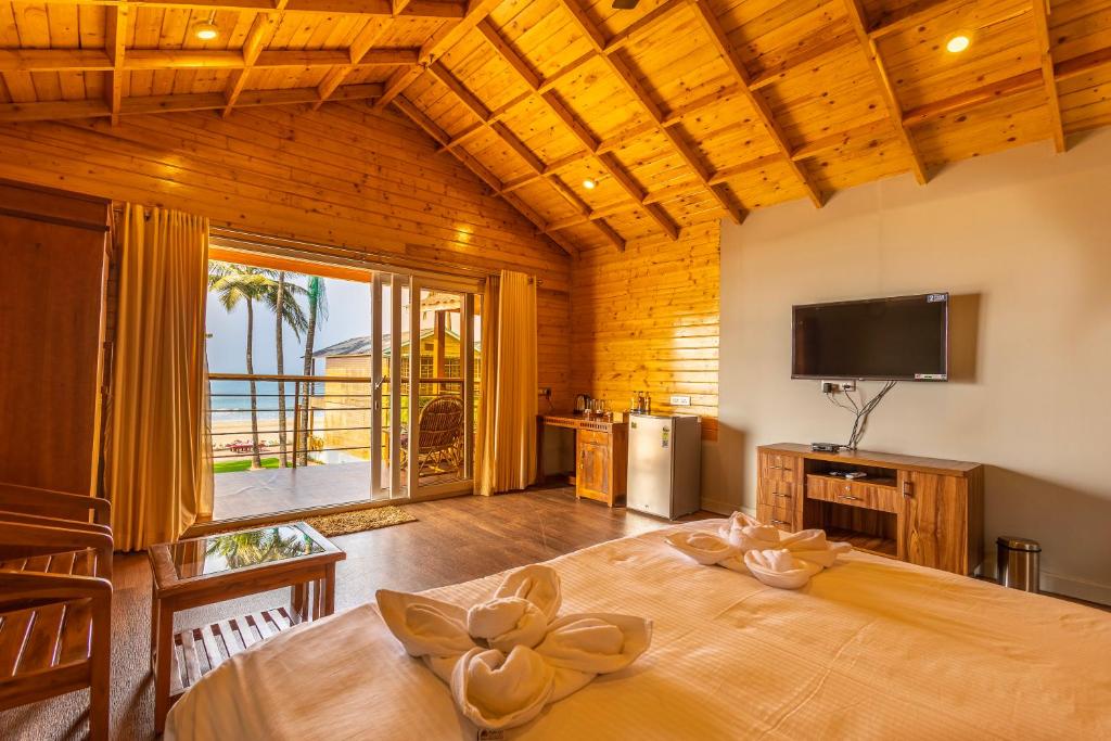 O2H Beach Resort - Tap to explore photos