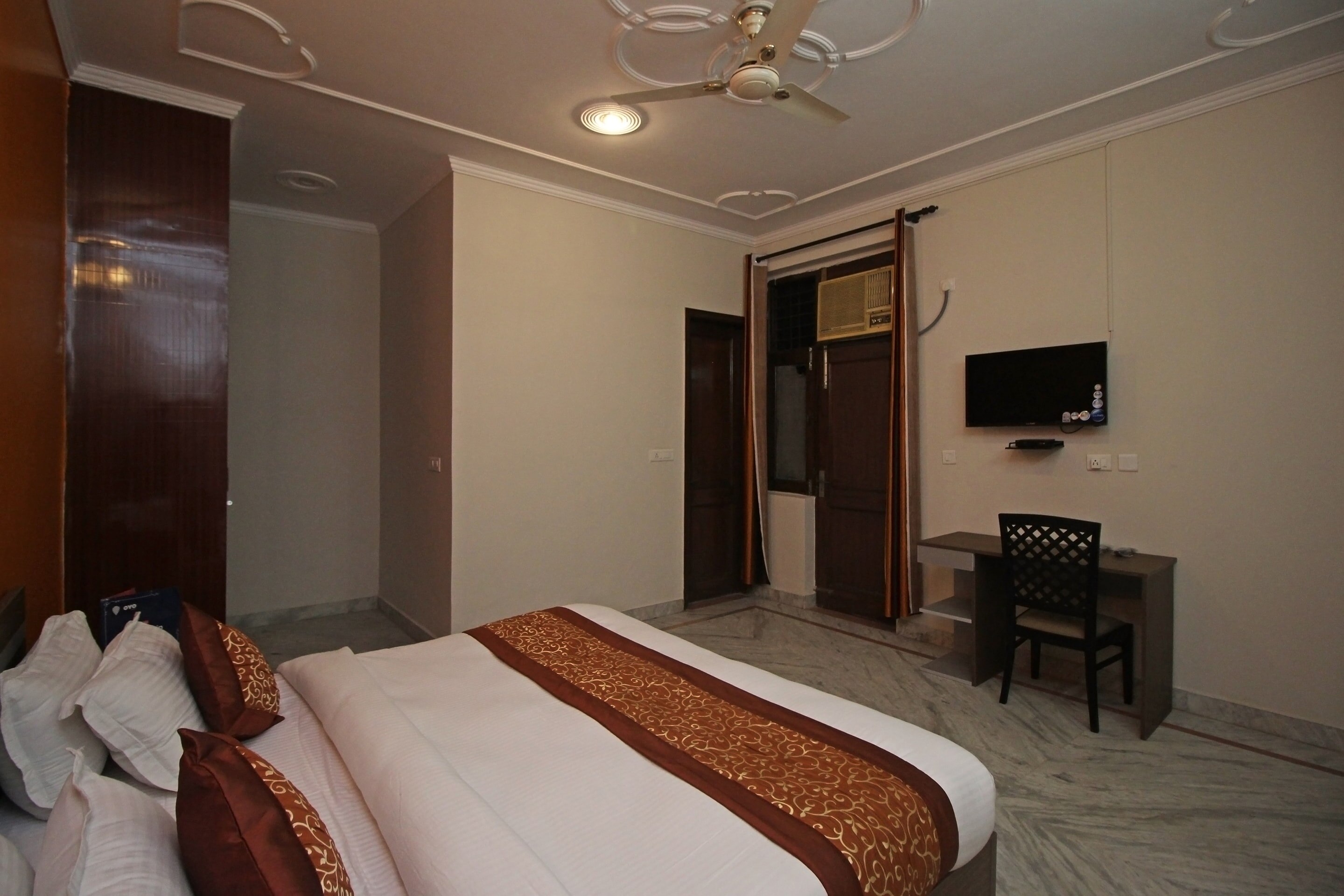 Hotel O 9075 Petals Inn - Tap to explore photos