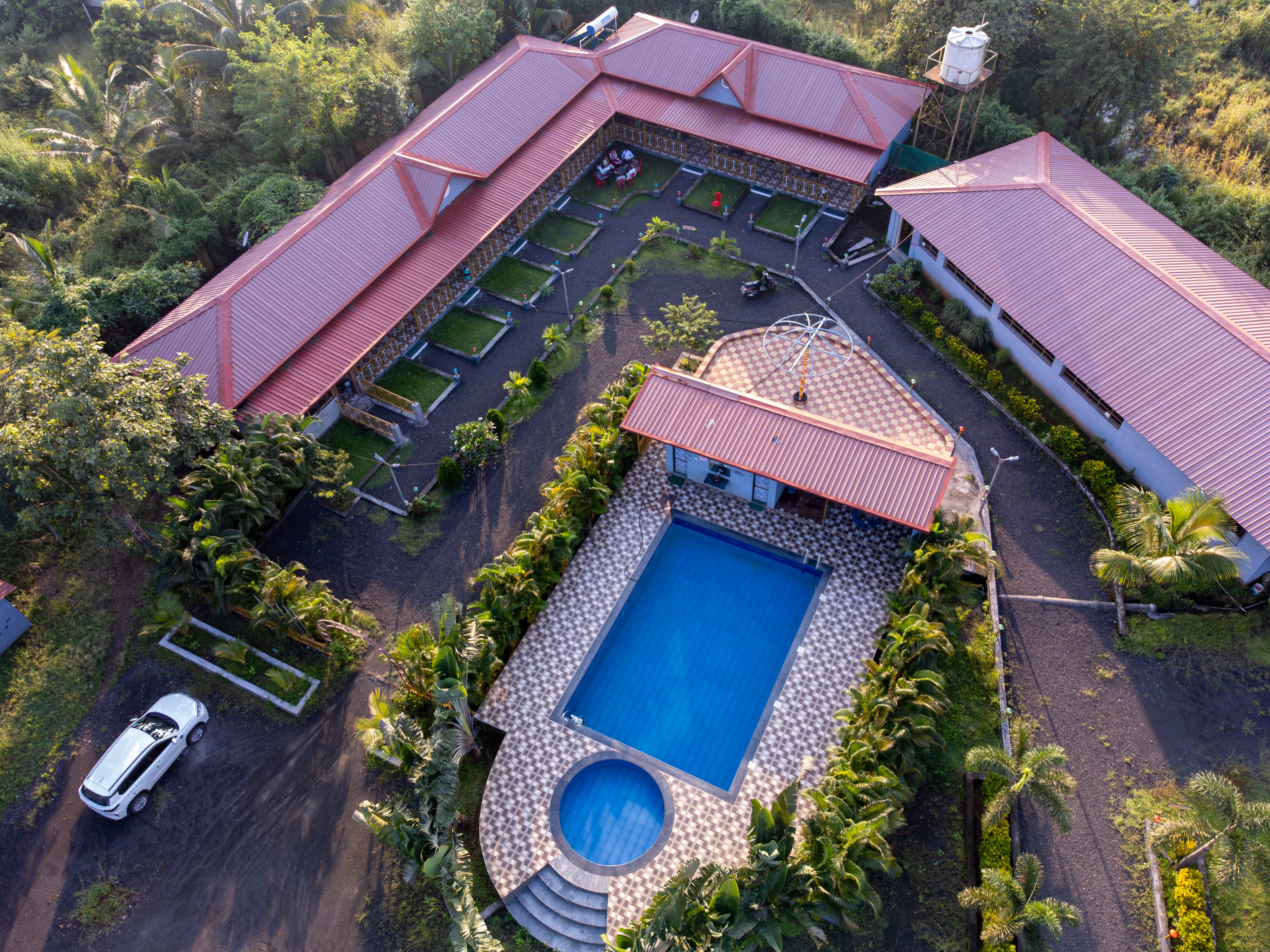 Shanti Forest Resort - Tap to explore photos