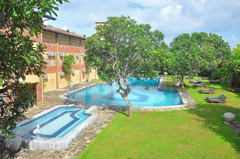 The Long Beach Resort Koggala - Tap to explore photos