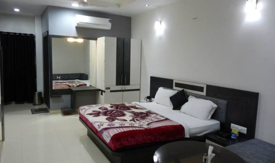 Hotel Satyam Inn - Tap to explore photos