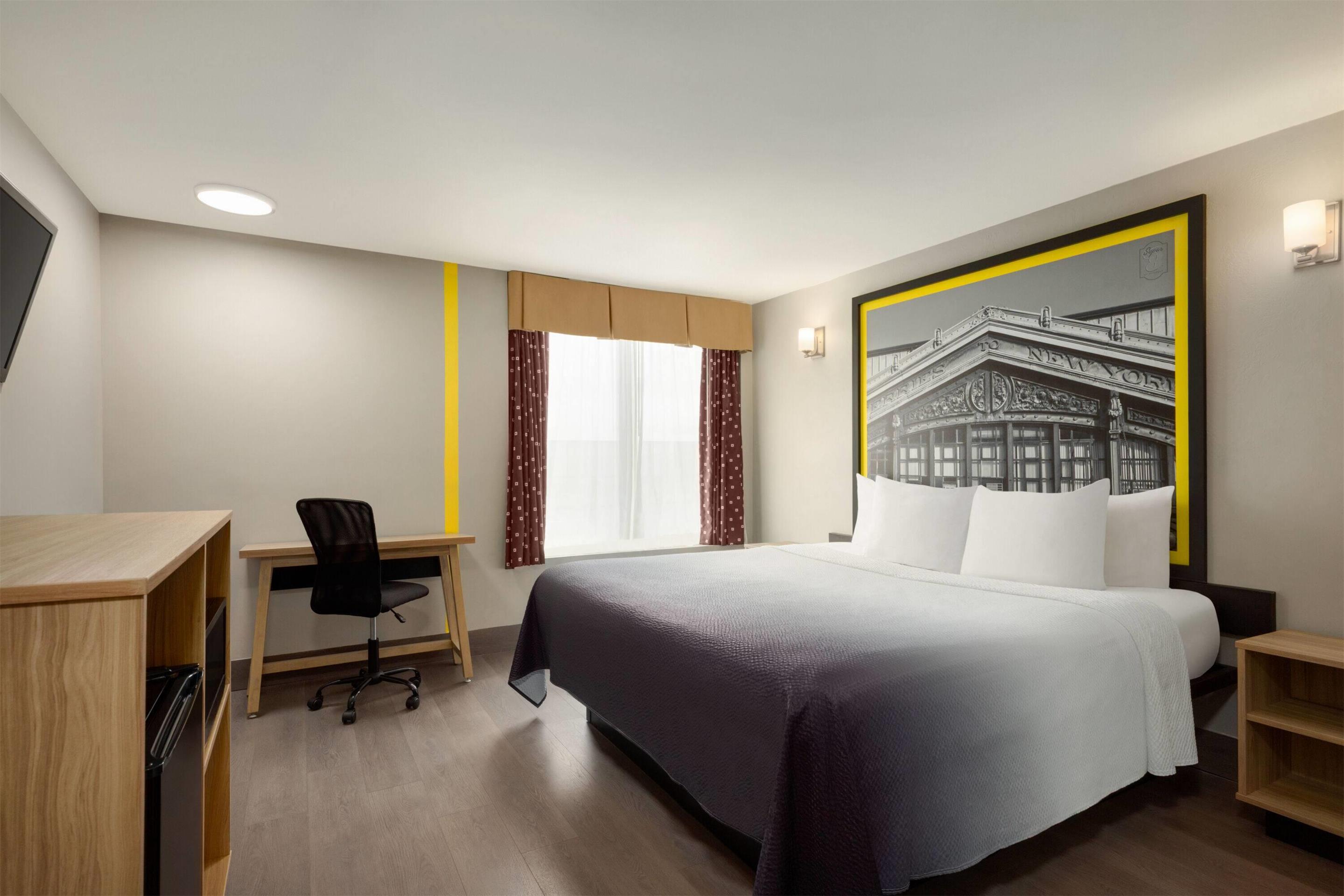Super 8 by Wyndham Meadowlands - Tap to explore photos