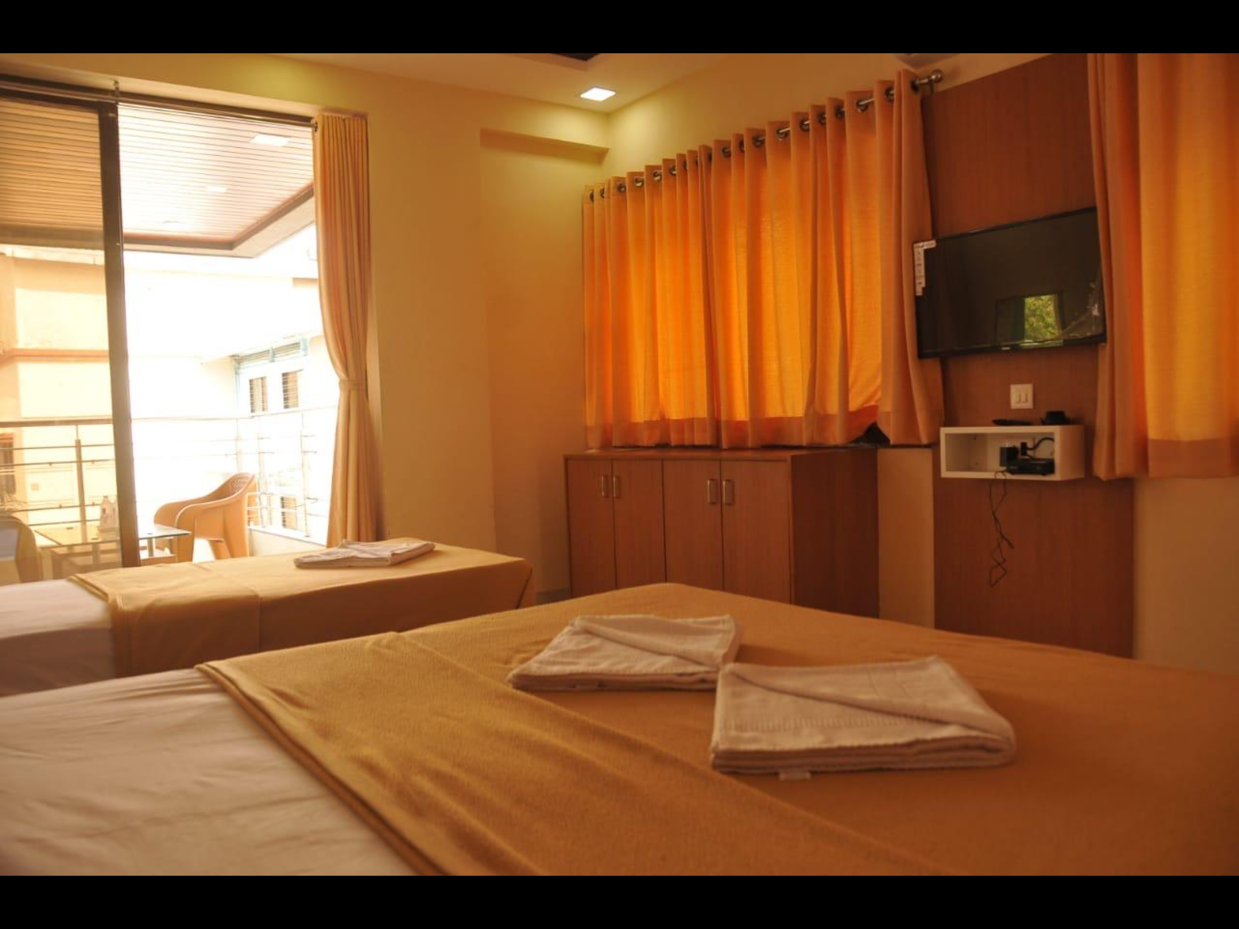 Hotel Tulsi Inn - Tap to explore photos