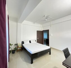 Cosy  Bedroom with Balcony, Common Living Room, Shared Bathroom and Kitchenette