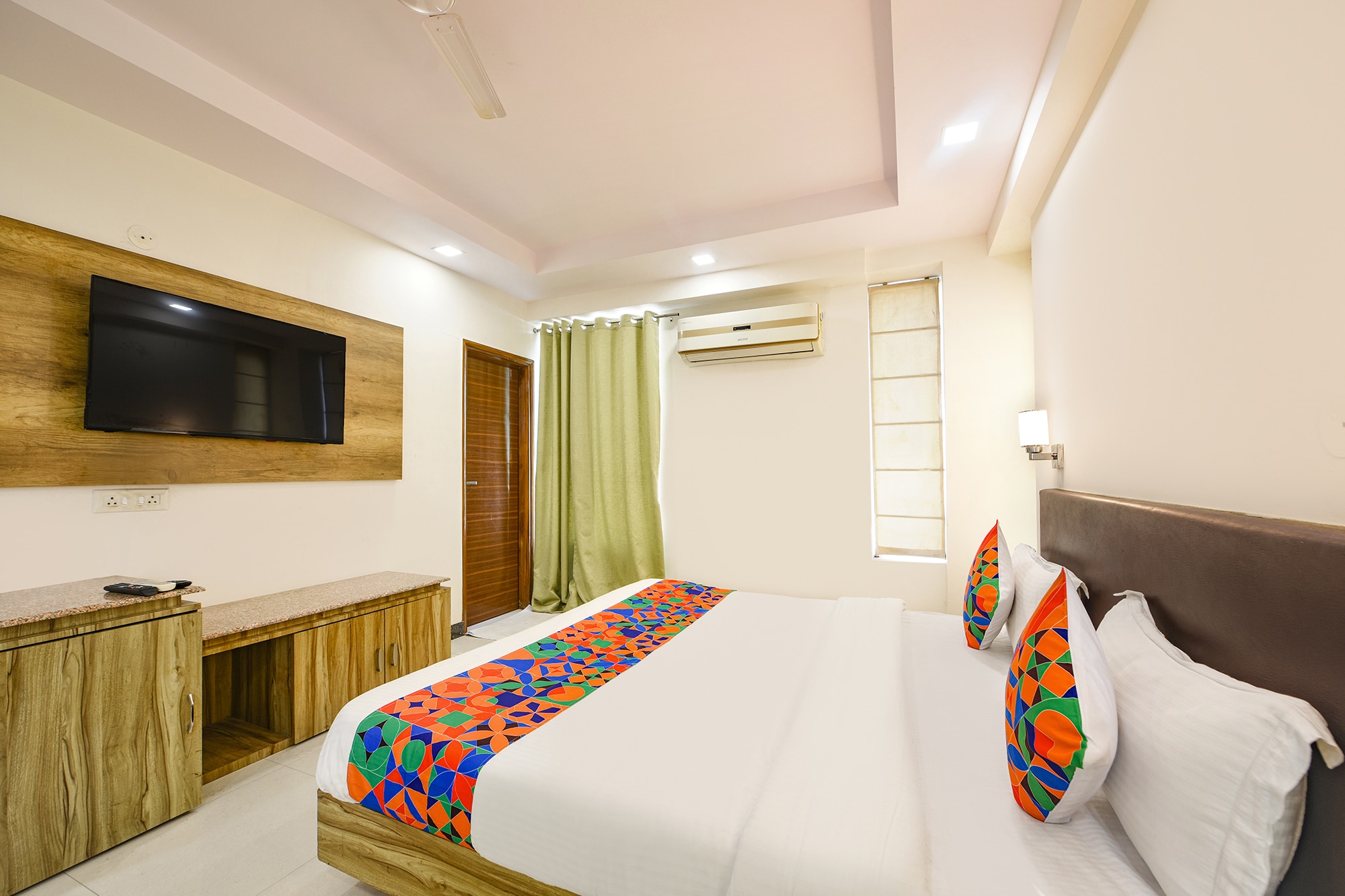FabHotel Angel Green Residency - UNITECH CYBER PARK - Tap to explore photos