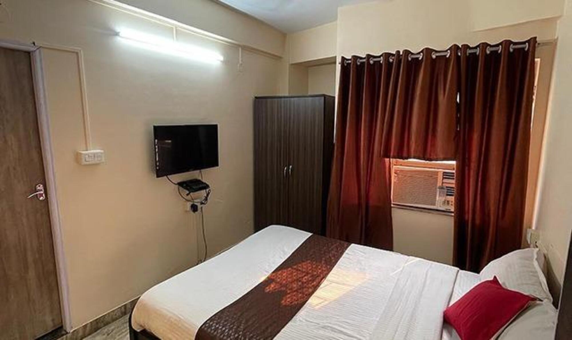 FabHotel Kolstay Inn - Near ghariahat market - Tap to explore photos