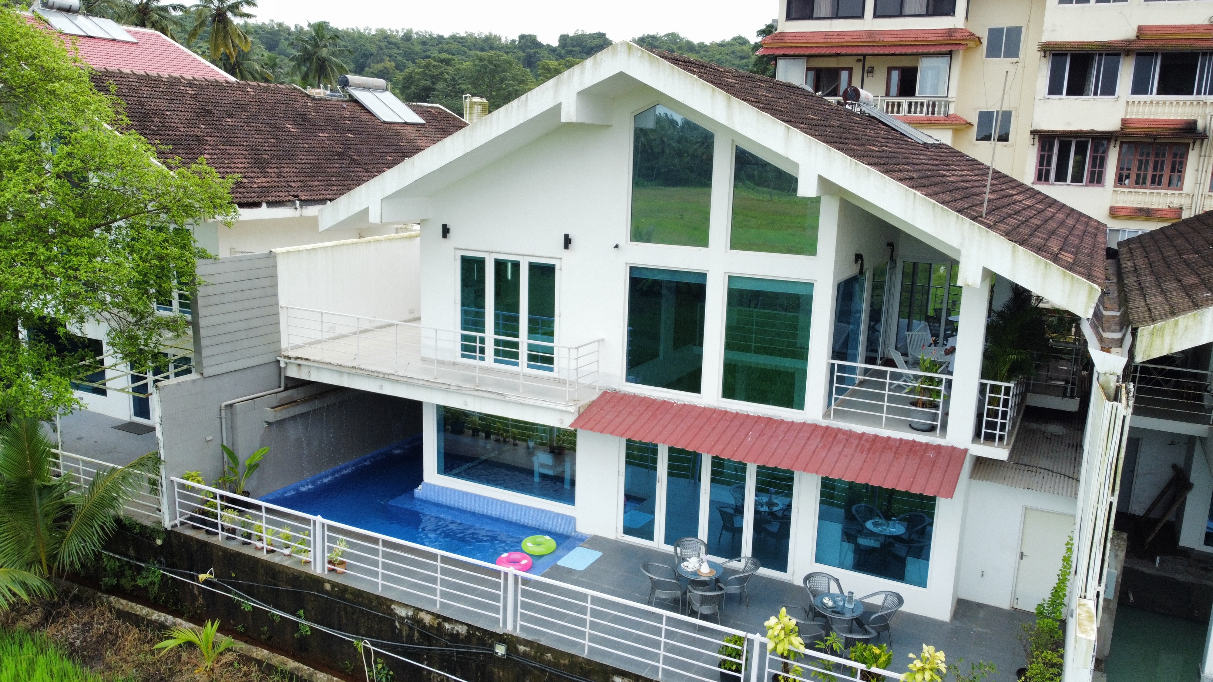 ELIVAAS 4 BHK Villa with Pvt Pool & Sunset view | Risaia - Tap to explore photos