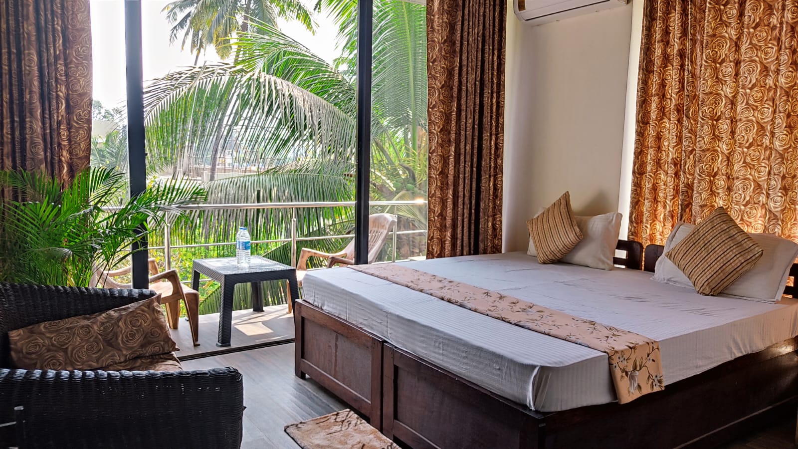 Sunrise Guest House at Baga Beach - Tap to explore photos