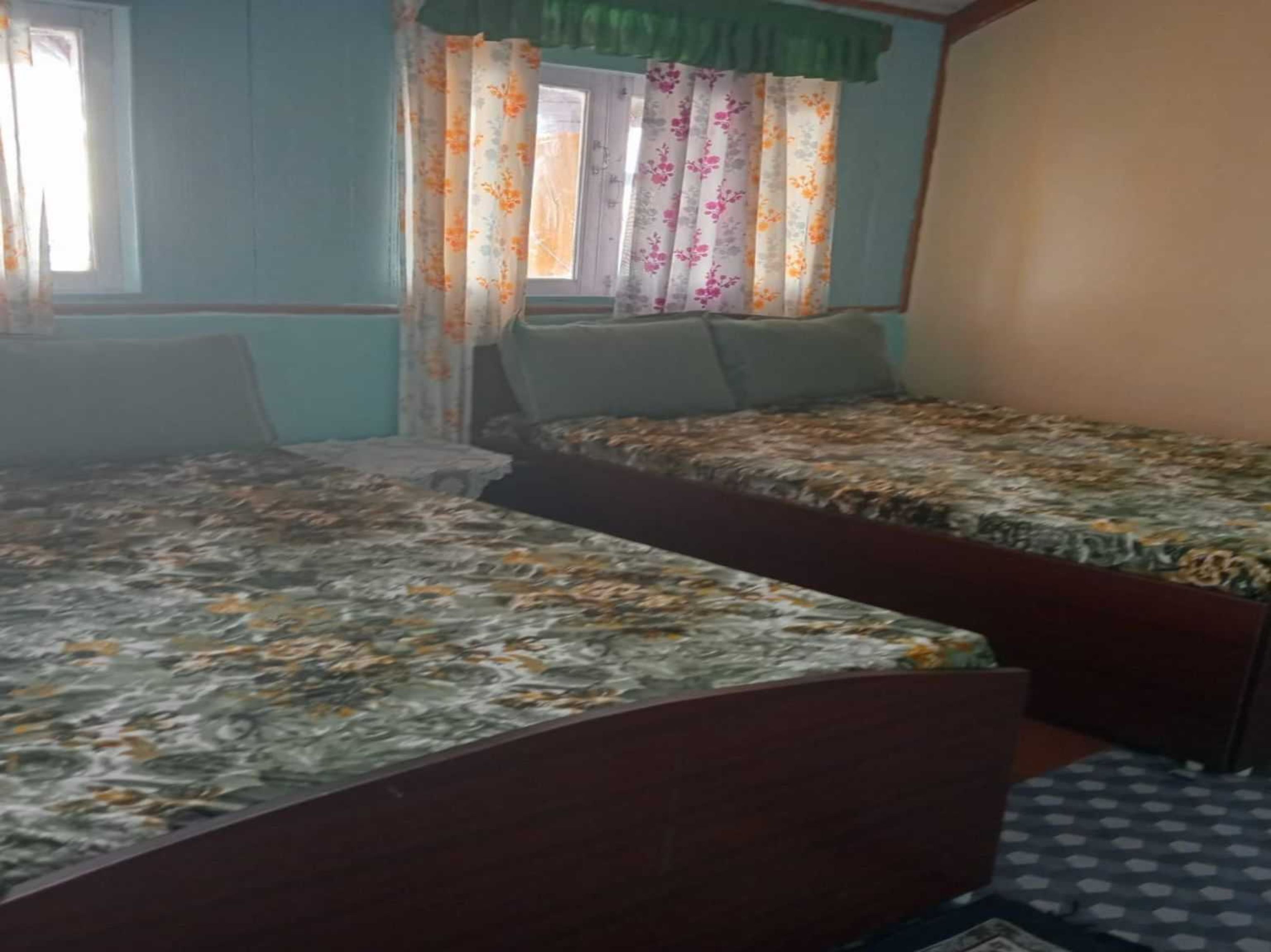 Hotel O HOME Phube homestay - Tap to explore photos