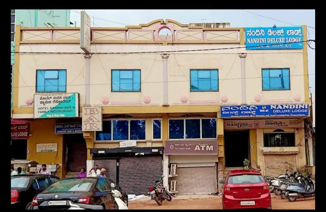 HOTEL NANDINI - Tap to explore photos