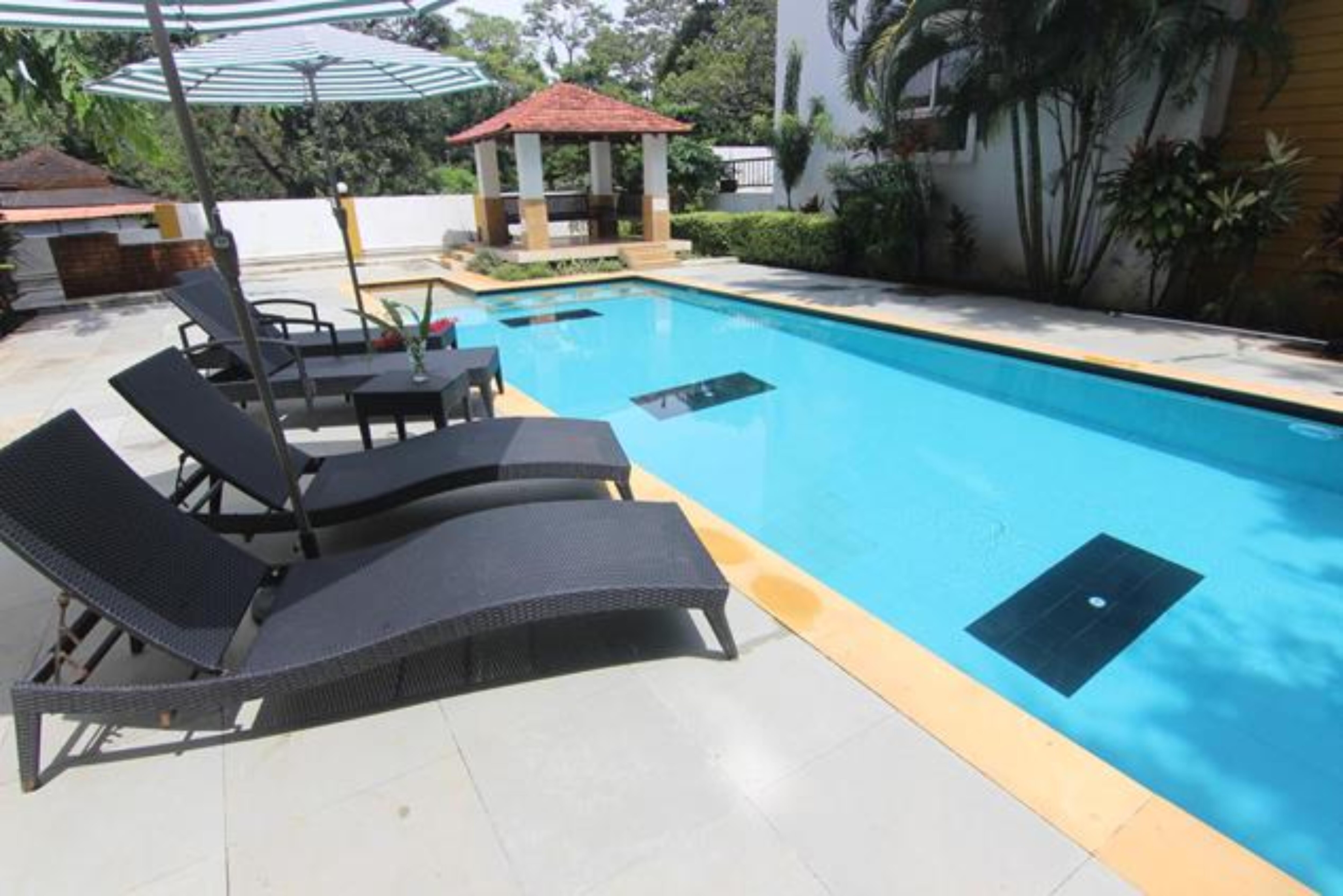 Rainforest Casa Del-Sol Poolside 2 BHK Apartment -CG - Tap to explore photos