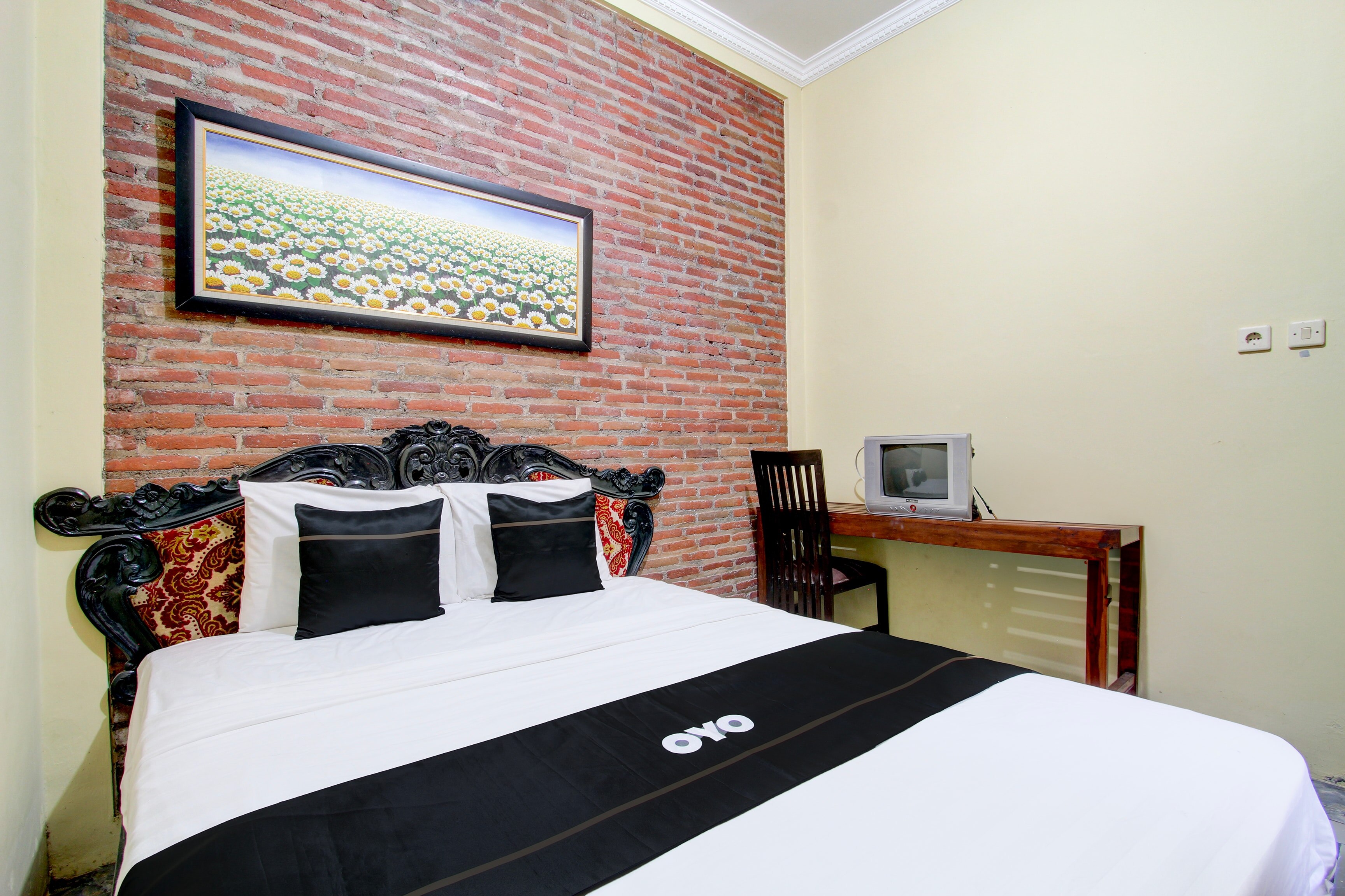 Capital O 93716 Family Guesthouse Syariah - Tap to explore photos