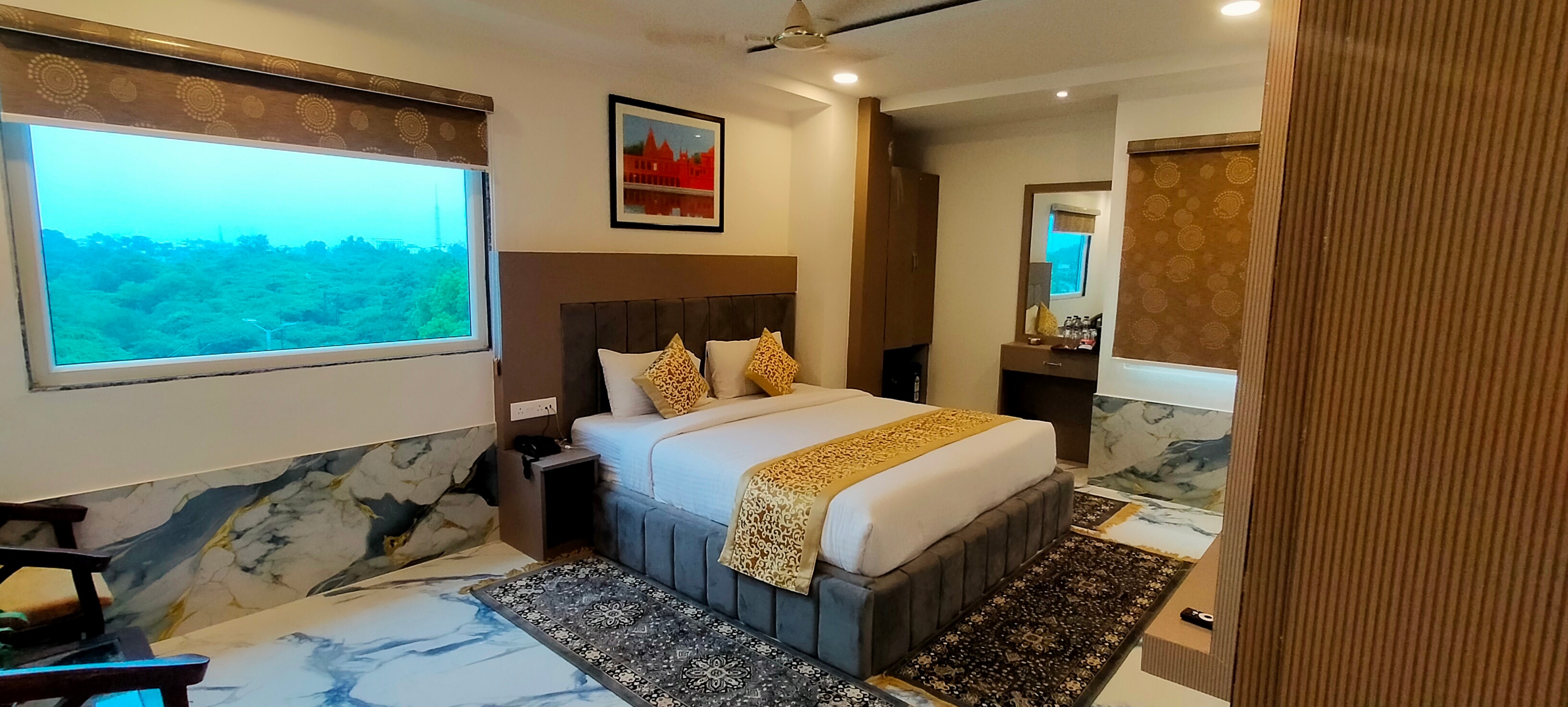 Hotel Varuna Grand - Tap to explore photos