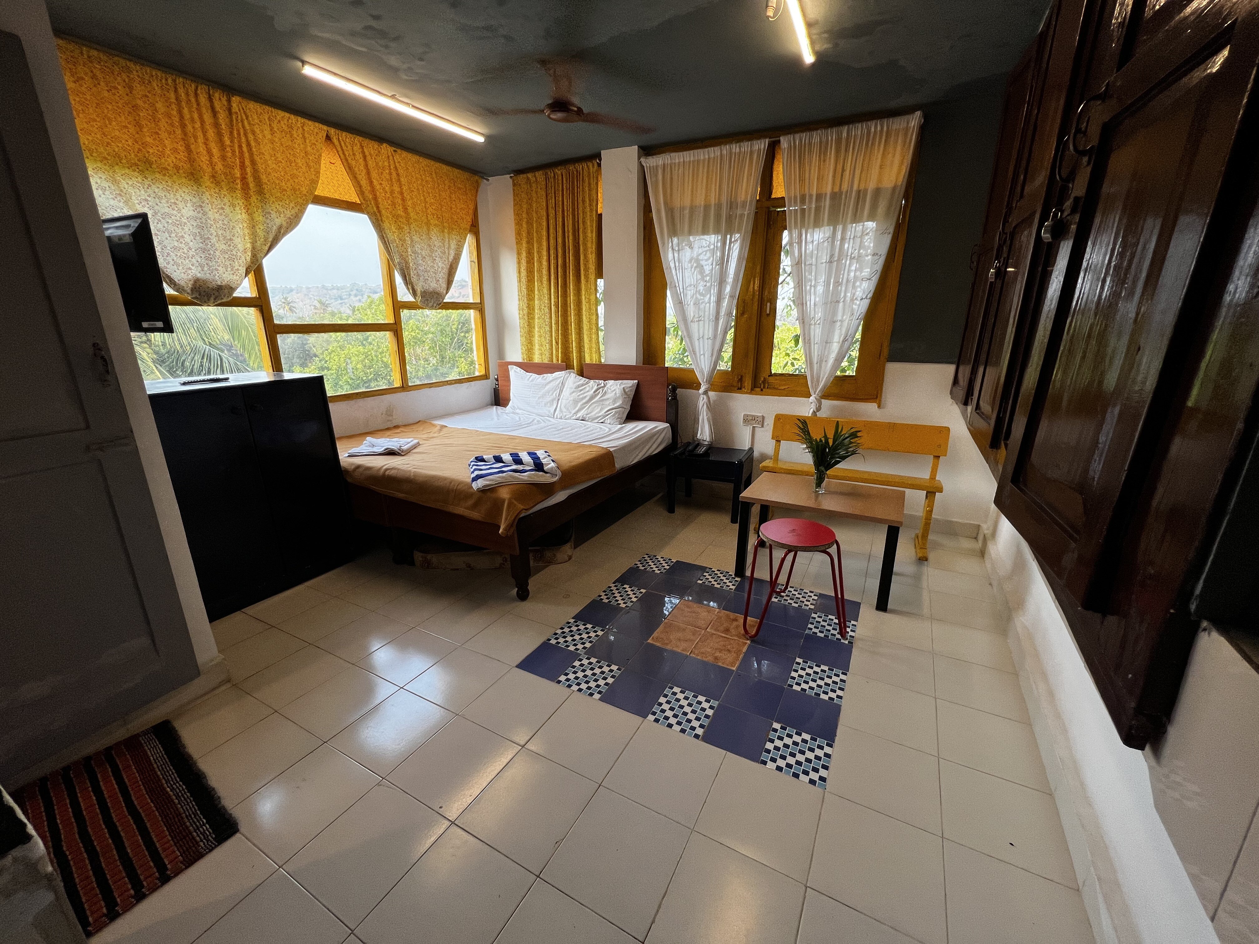 QNQ Candolim Retreat - Tap to explore photos