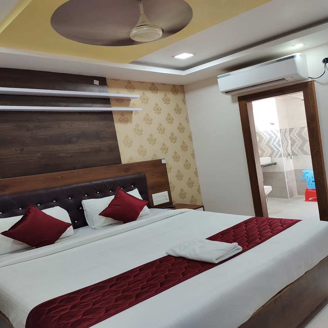 hotel Navya Grand - Tap to explore photos