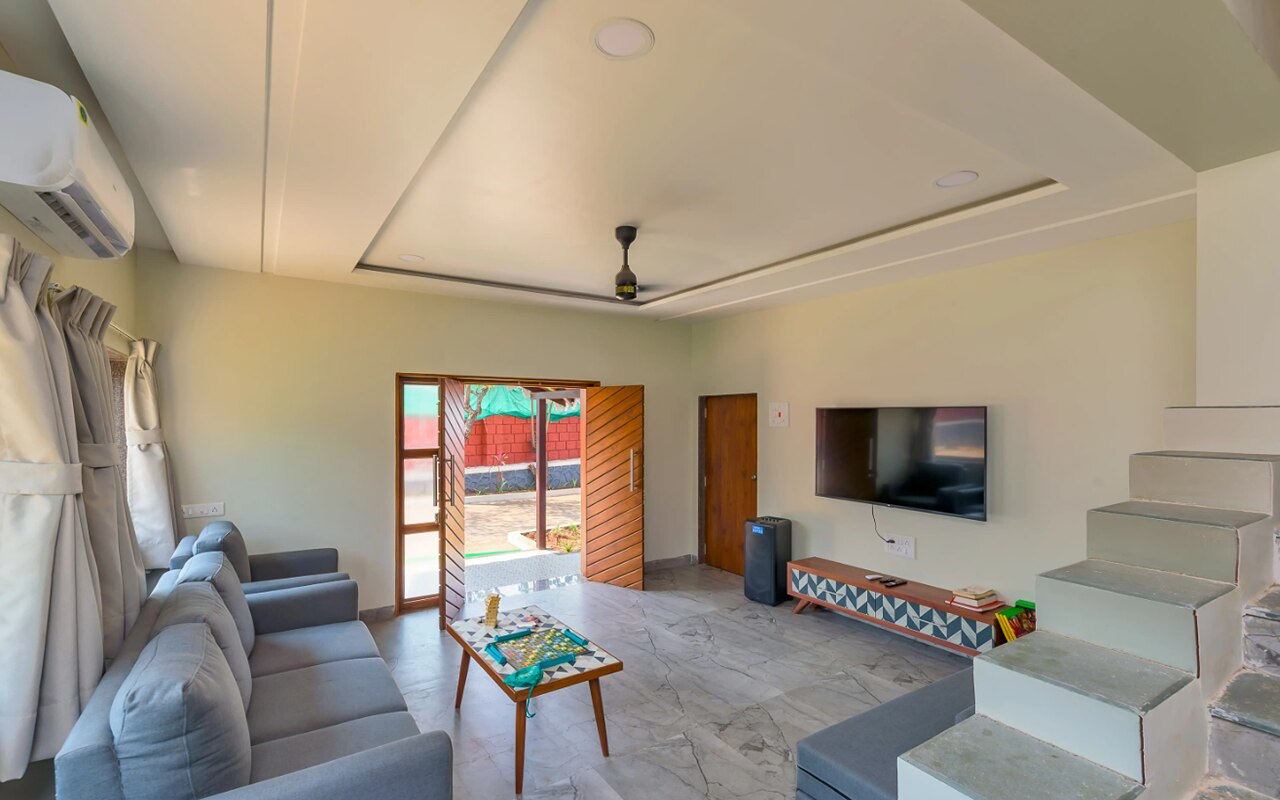 SaffronStays Coral By The Beach Roomwise - Tap to explore photos