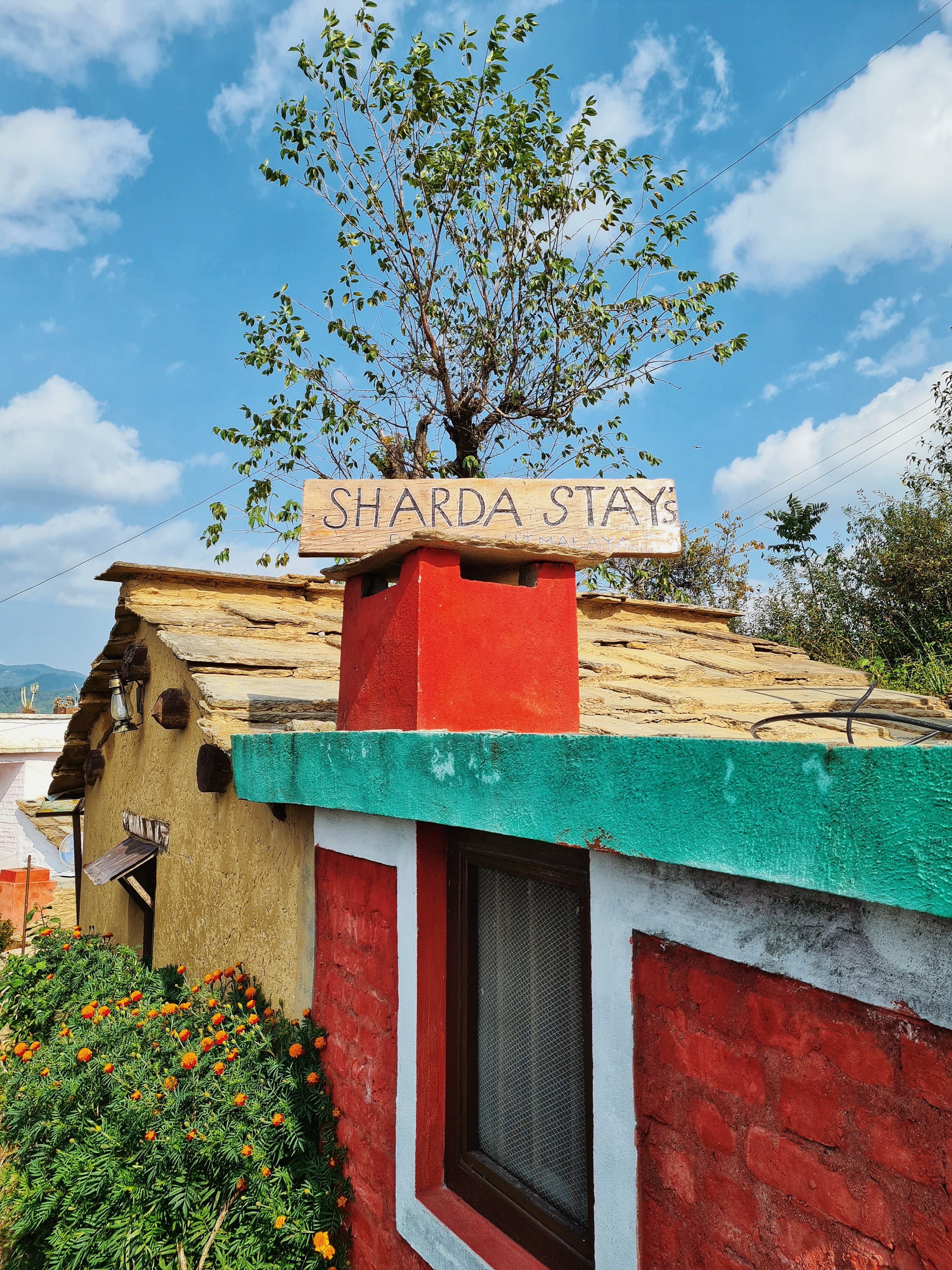 Sharda Stays Earth House - Tap to explore photos