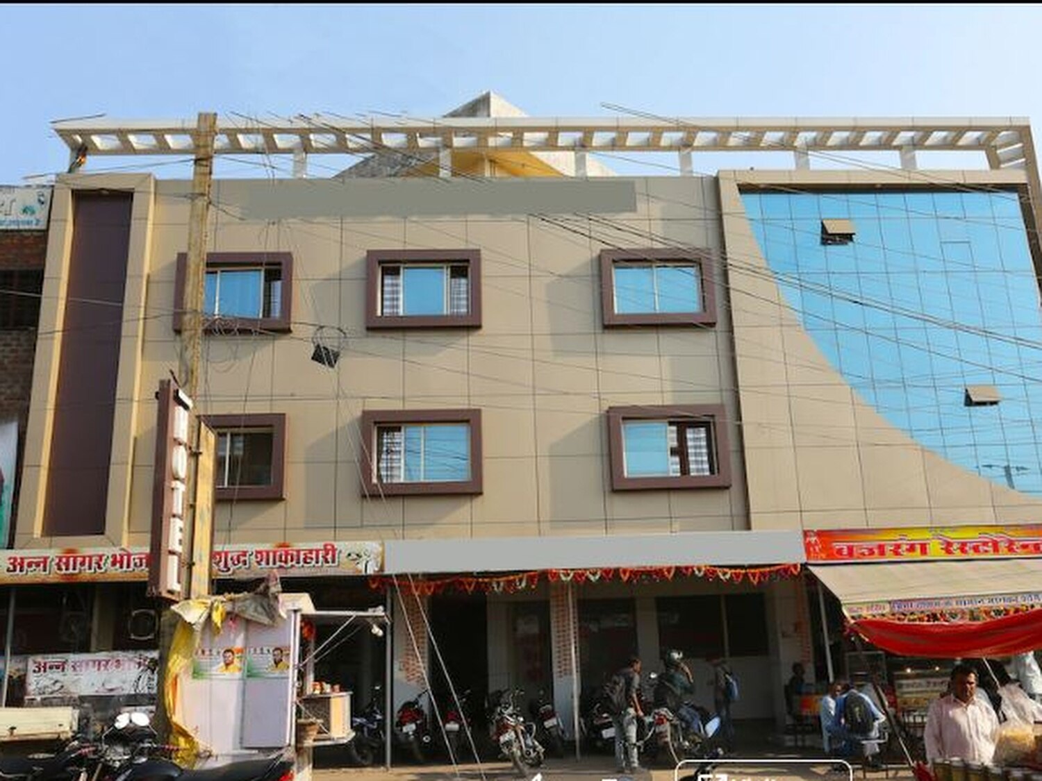 Hotel Dev Shree - Tap to explore photos