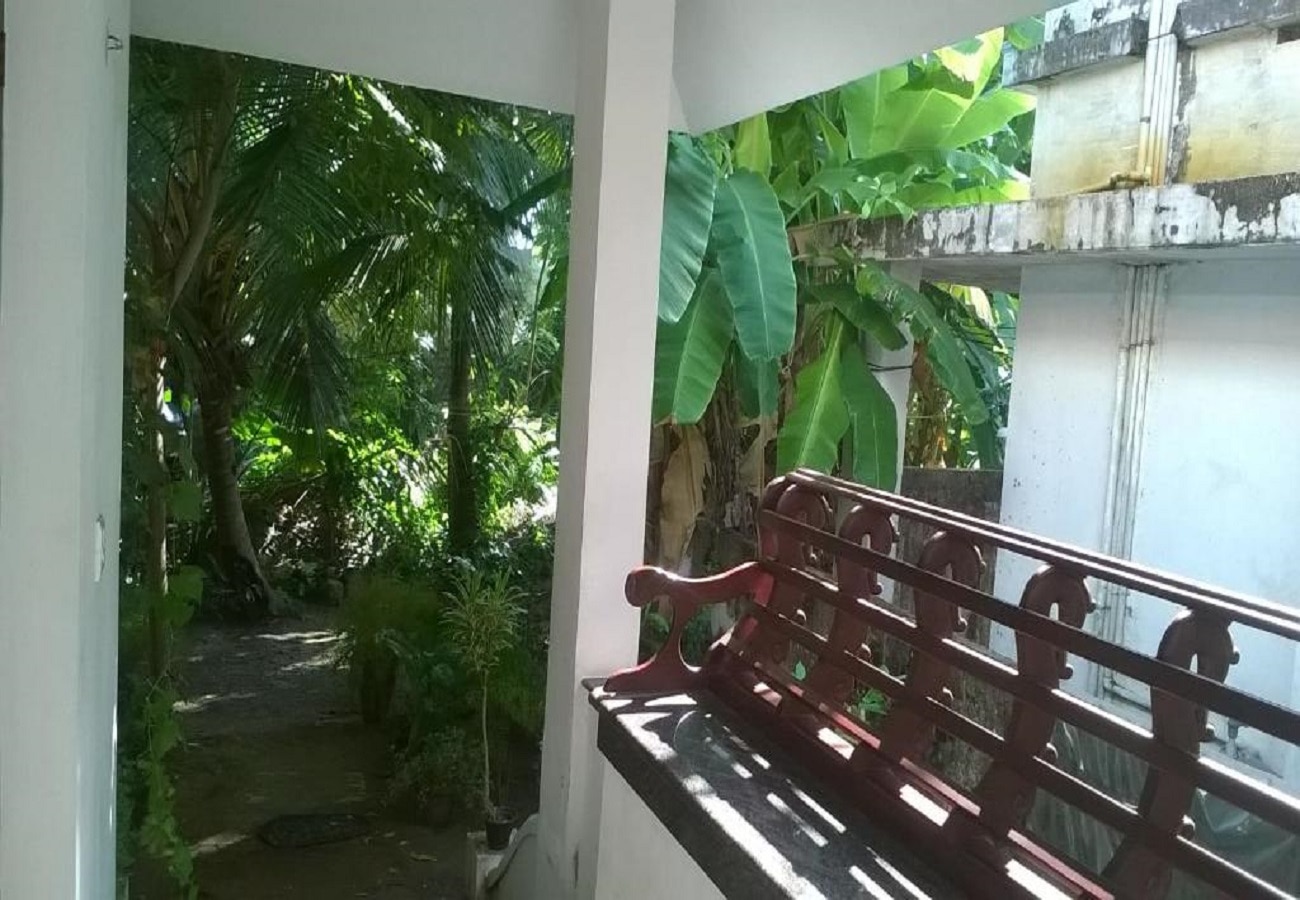 Coconut Grove Homestay (Standard Room) - Tap to explore photos