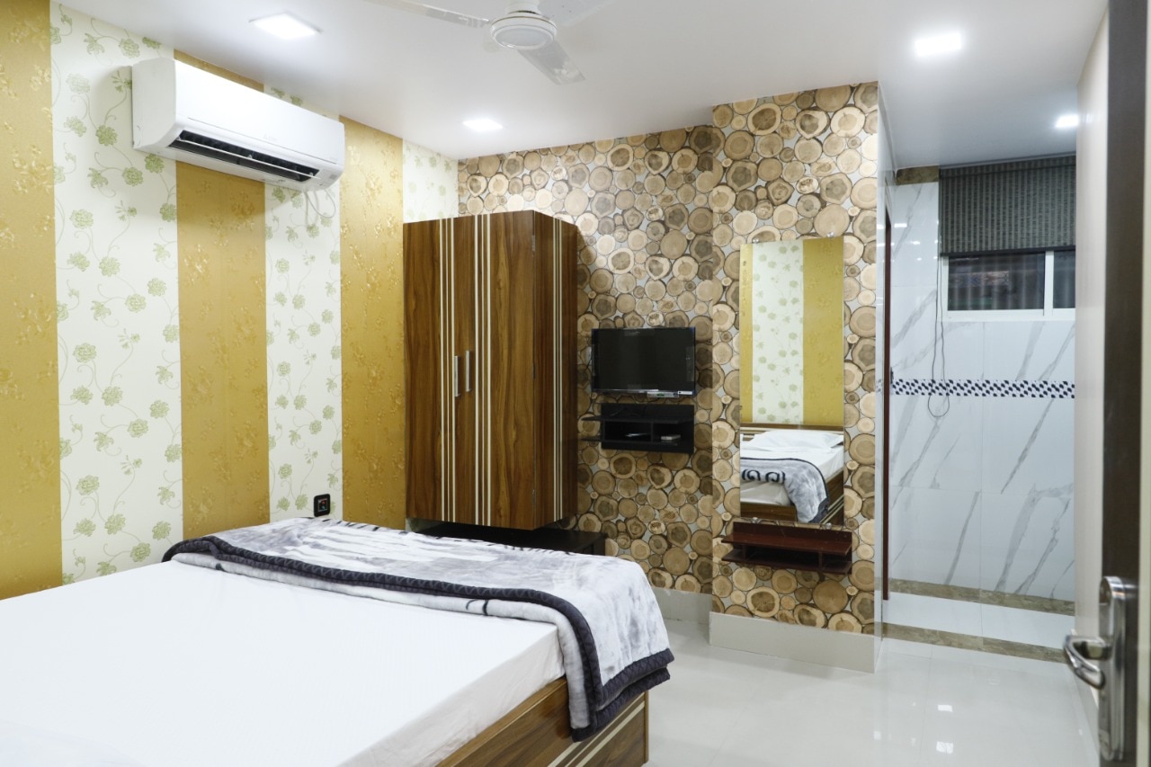 Manyavar Guest House - Tap to explore photos