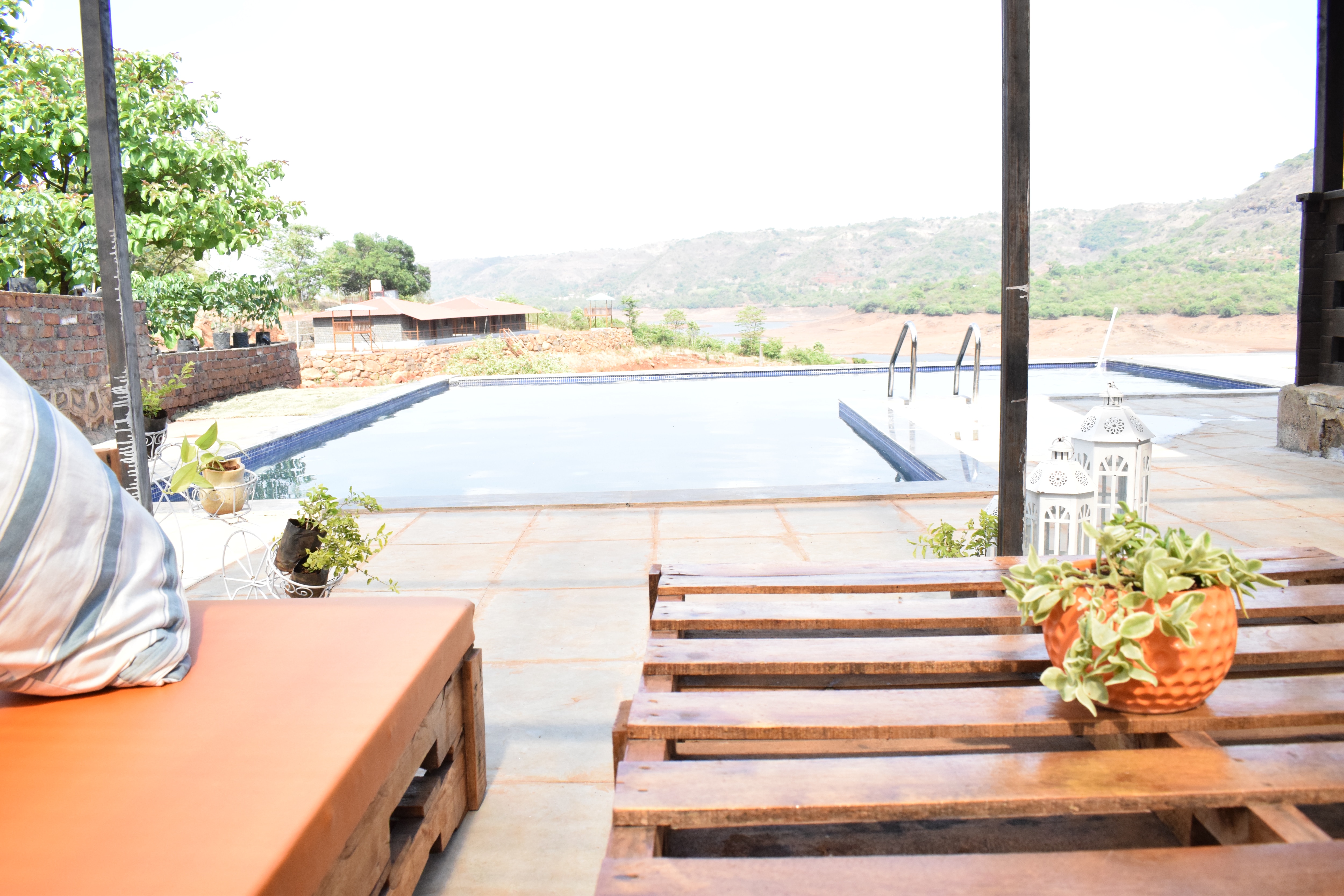 The Mango Tree Bhor by Waterrock Stays - Tap to explore photos