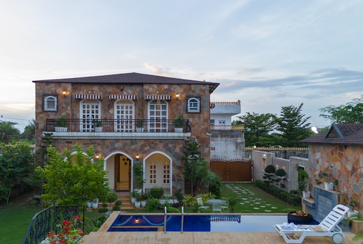 Fancy 6 BHK Villa with Pool Surrounded by Lush Greenery