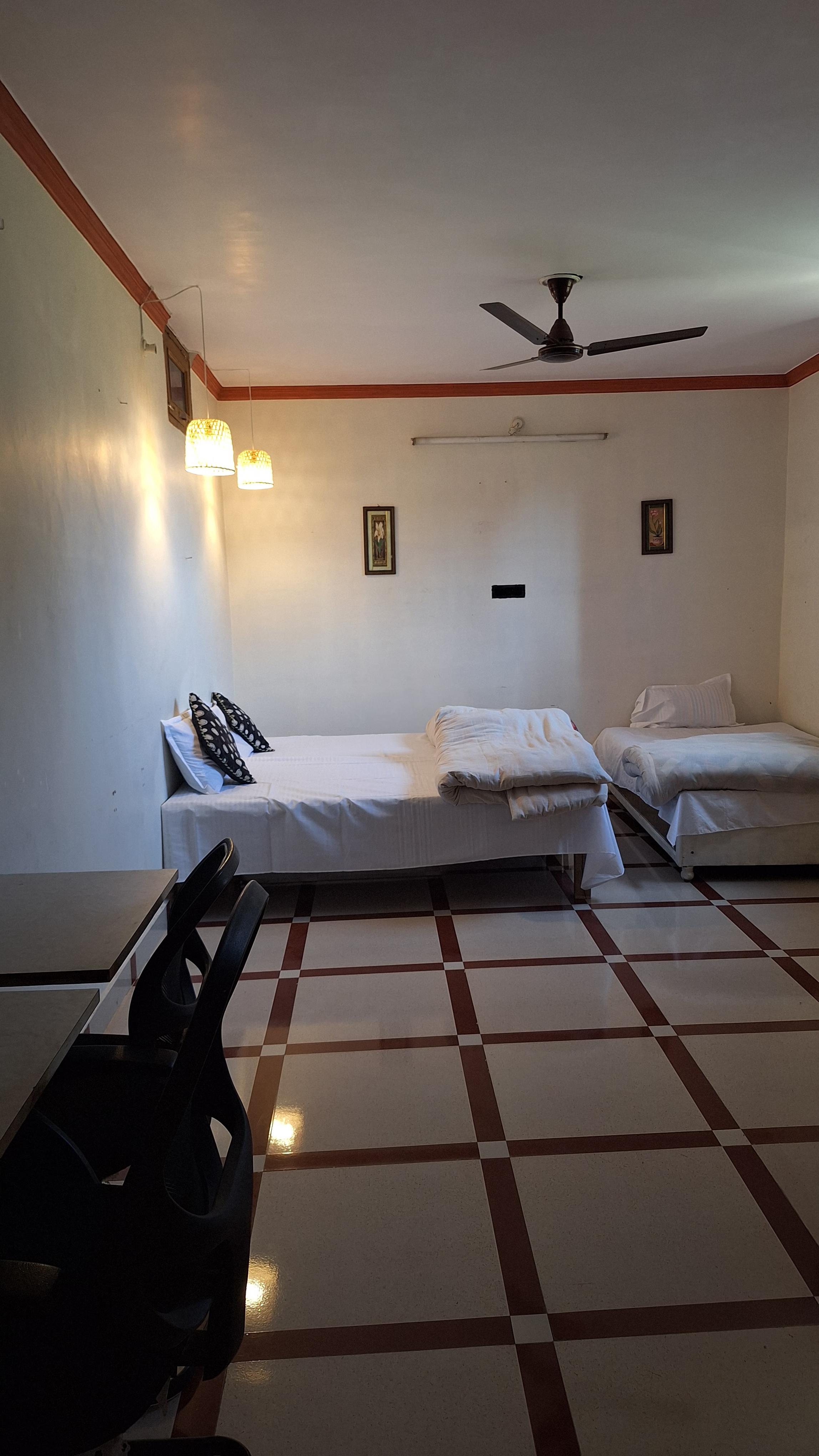 Triveni Stays - Tap to explore photos